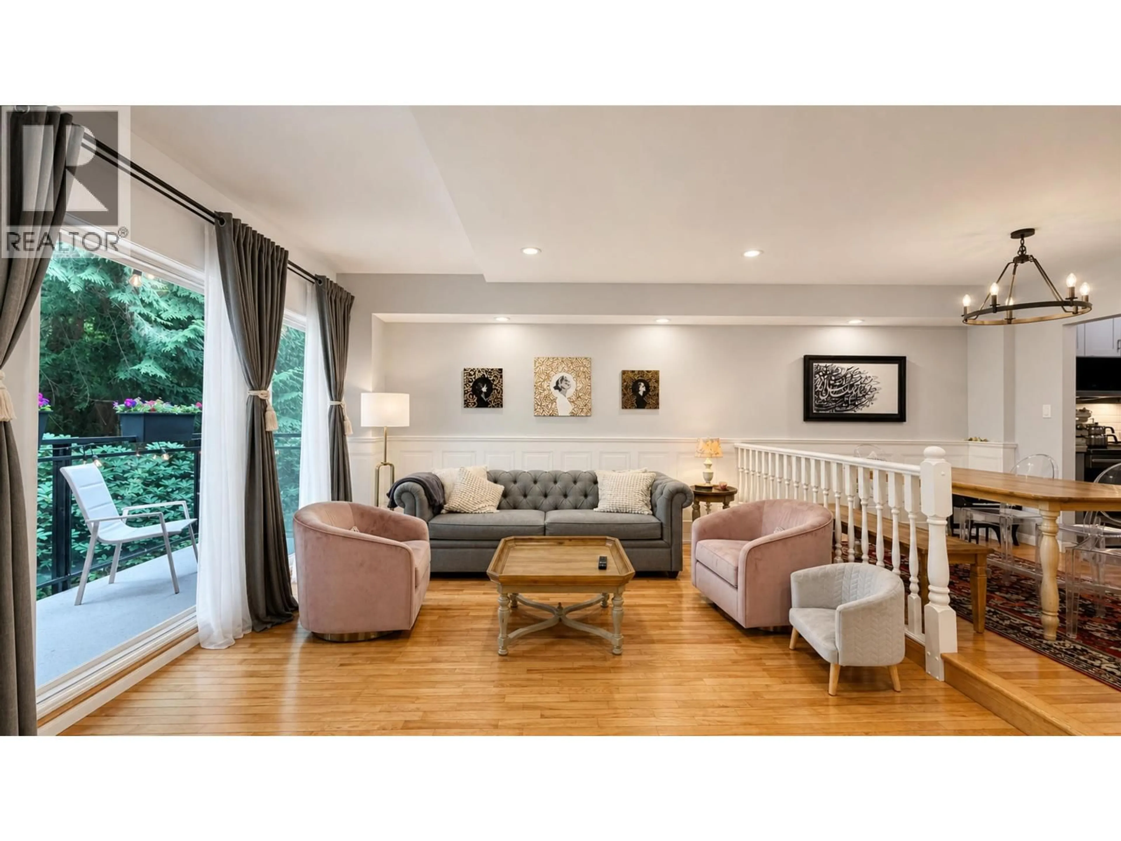 Living room with furniture, wood/laminate floor for 3938 INDIAN RIVER DRIVE, North Vancouver British Columbia V7G2G9