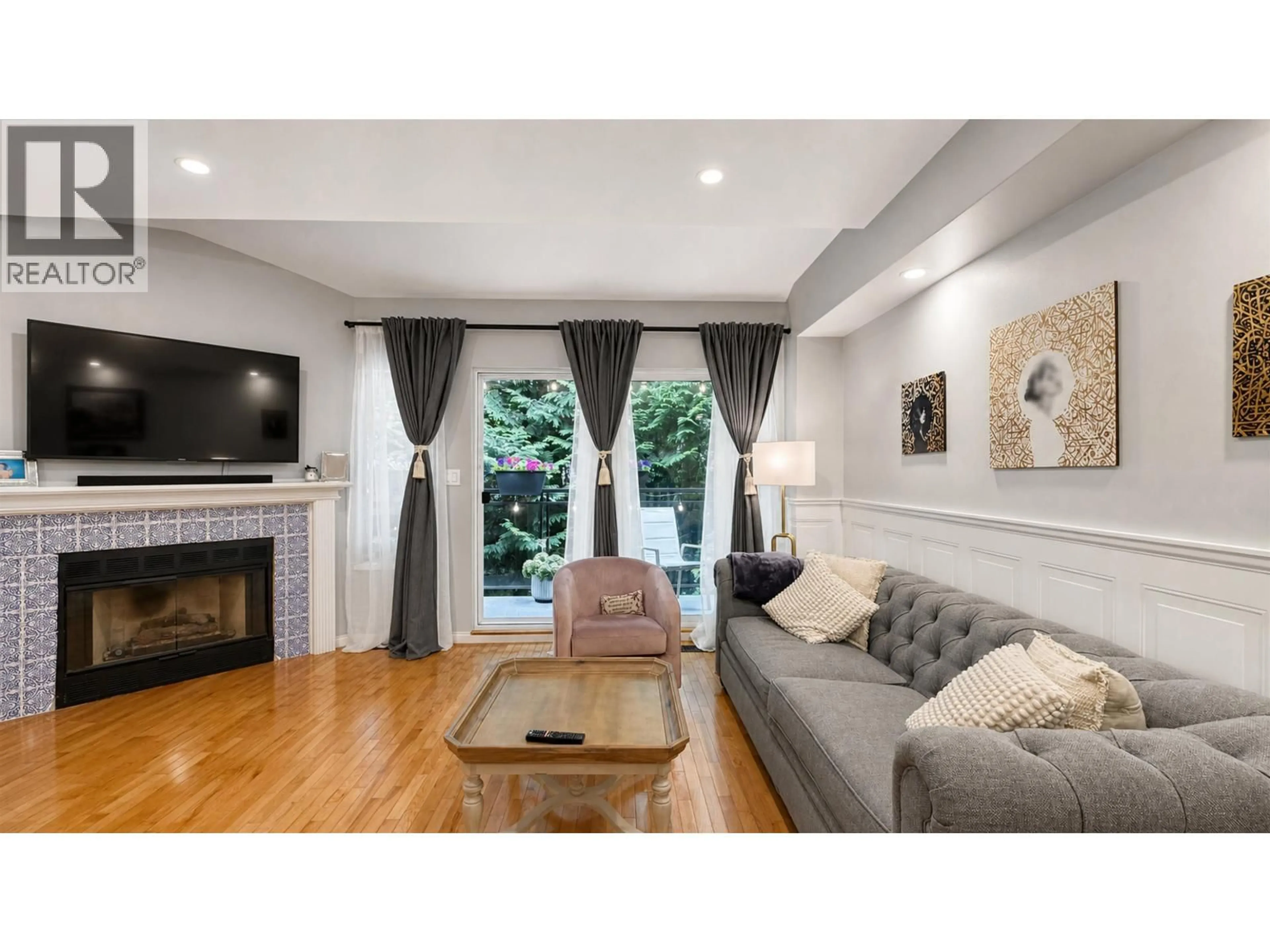 Living room with furniture, wood/laminate floor for 3938 INDIAN RIVER DRIVE, North Vancouver British Columbia V7G2G9