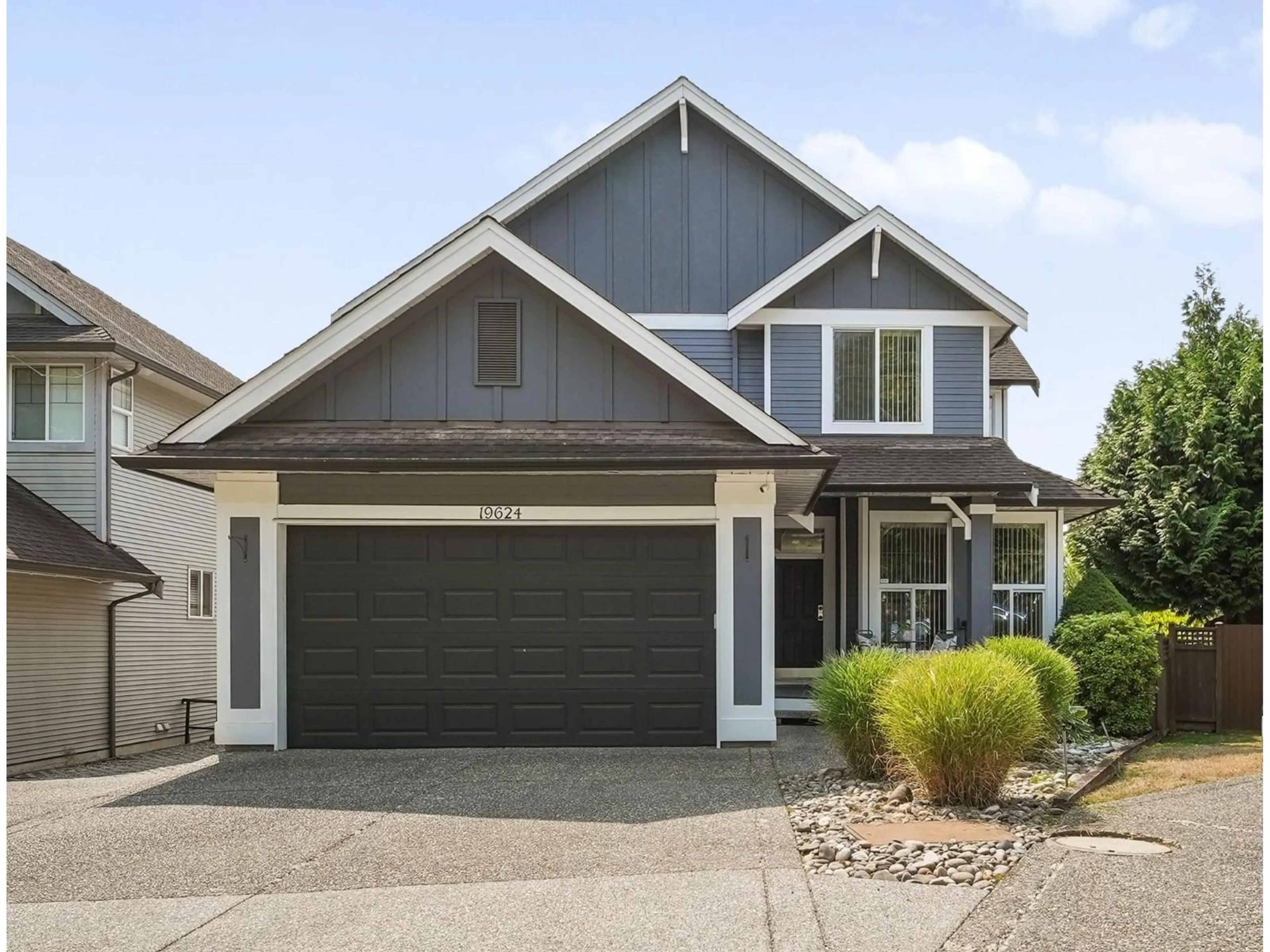 Home with vinyl exterior material, street for 19624 69A AVENUE, Langley British Columbia V2Y3A6