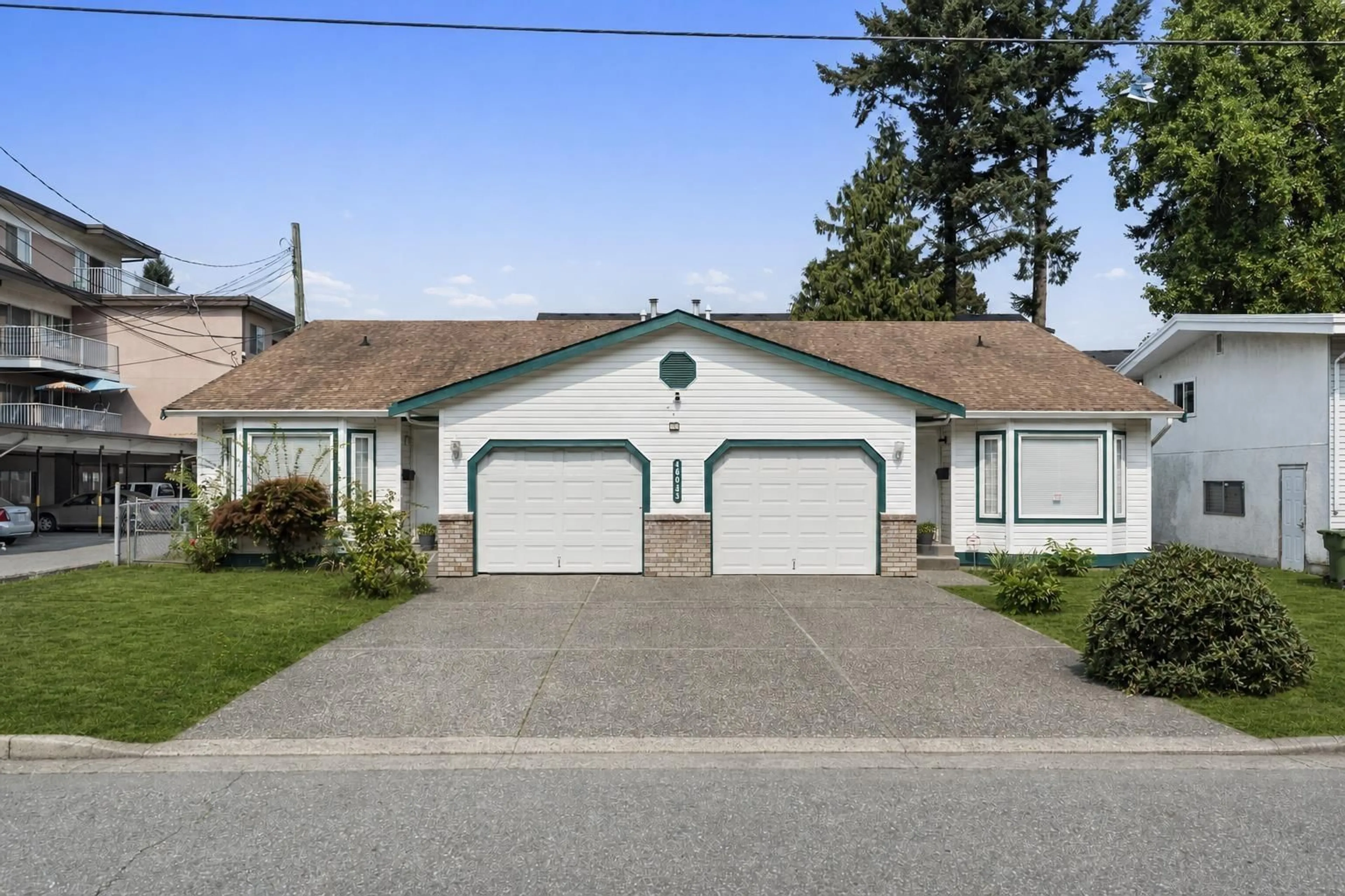 Home with vinyl exterior material, street for 1&2 - 46043 MELLARD AVENUE, Chilliwack British Columbia V2P2Y8