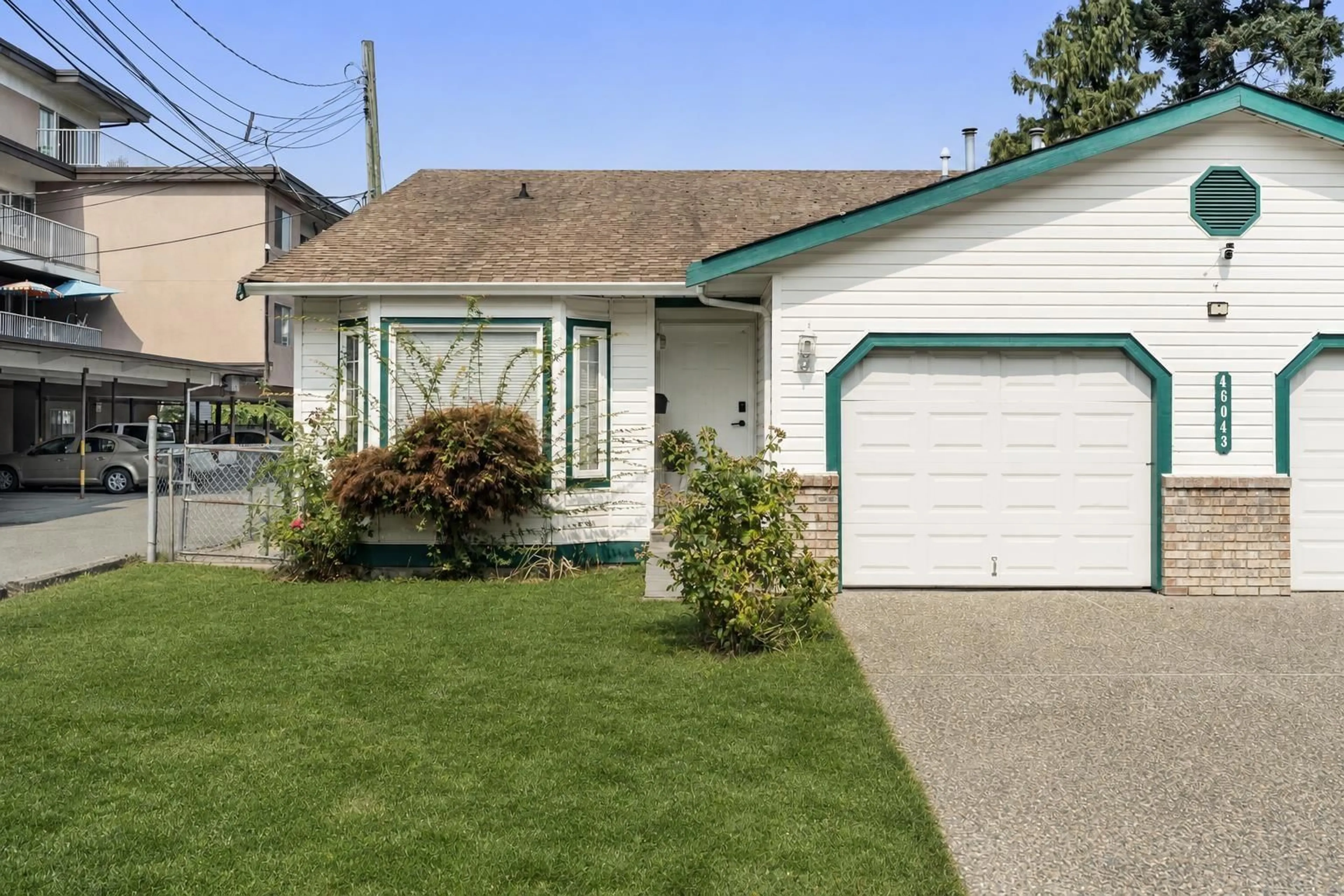 Home with vinyl exterior material, street for 1&2 - 46043 MELLARD AVENUE, Chilliwack British Columbia V2P2Y8