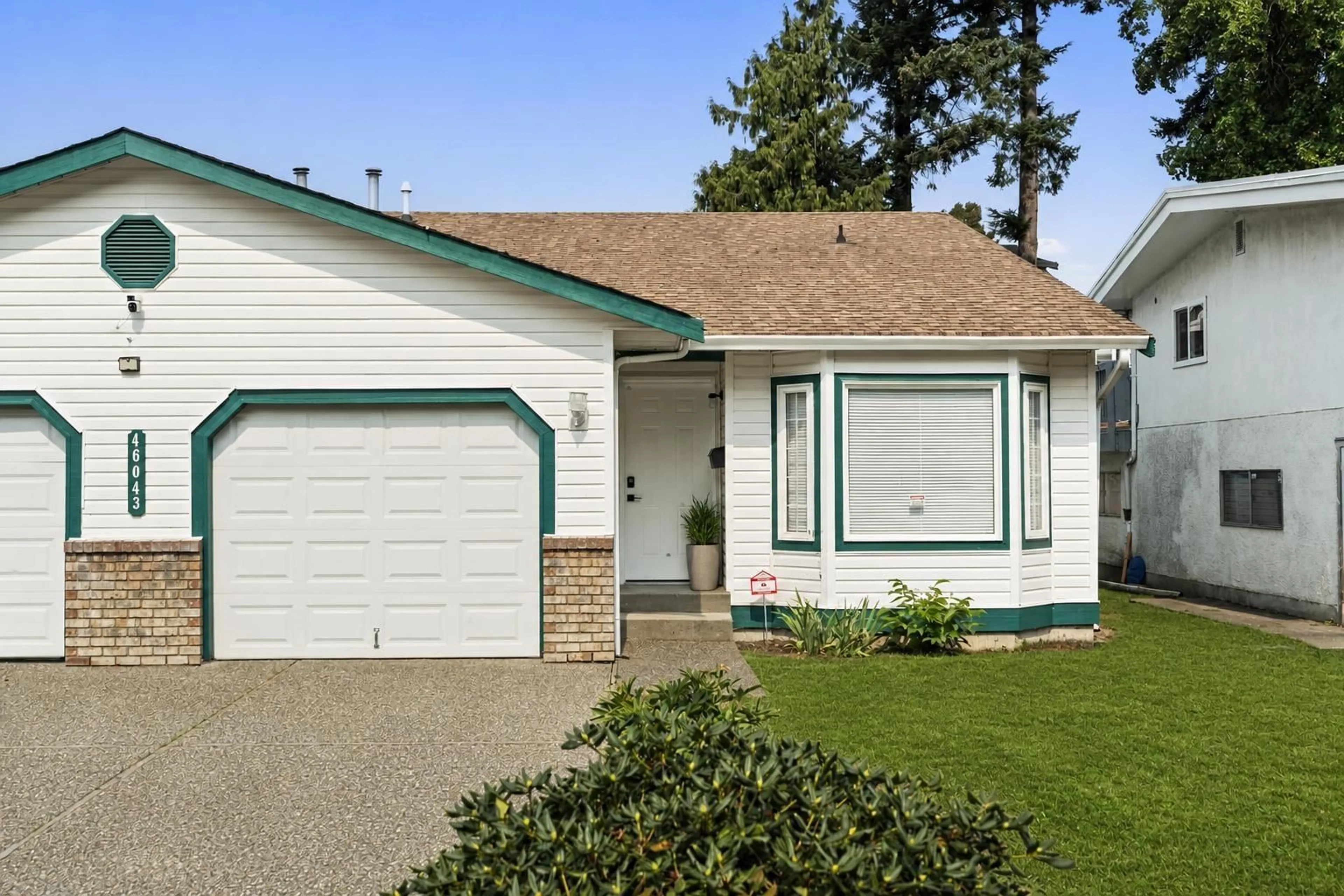 Home with vinyl exterior material, street for 1&2 - 46043 MELLARD AVENUE, Chilliwack British Columbia V2P2Y8