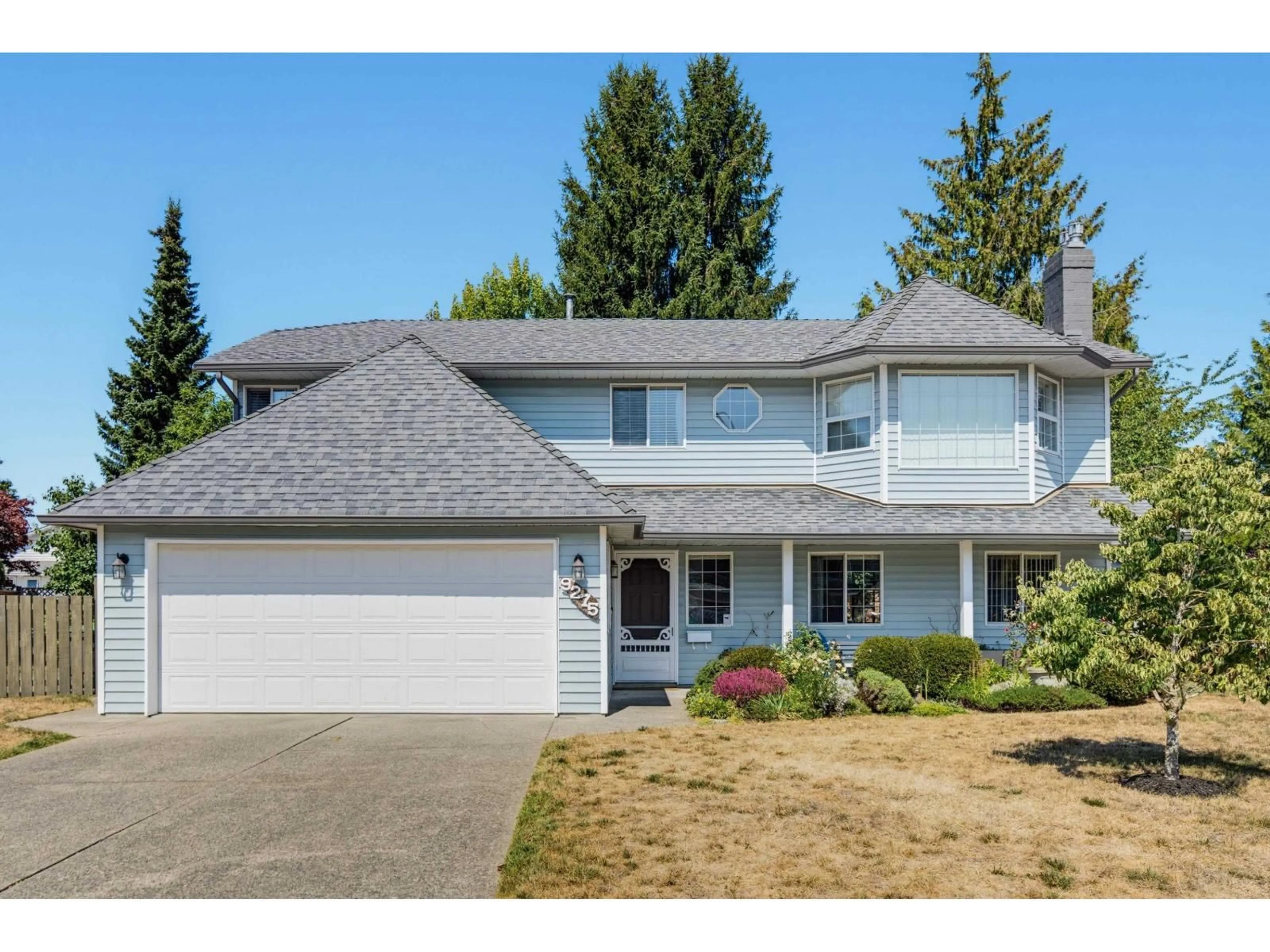 Home with vinyl exterior material, street for 9275 155 STREET, Surrey British Columbia V3R9B3