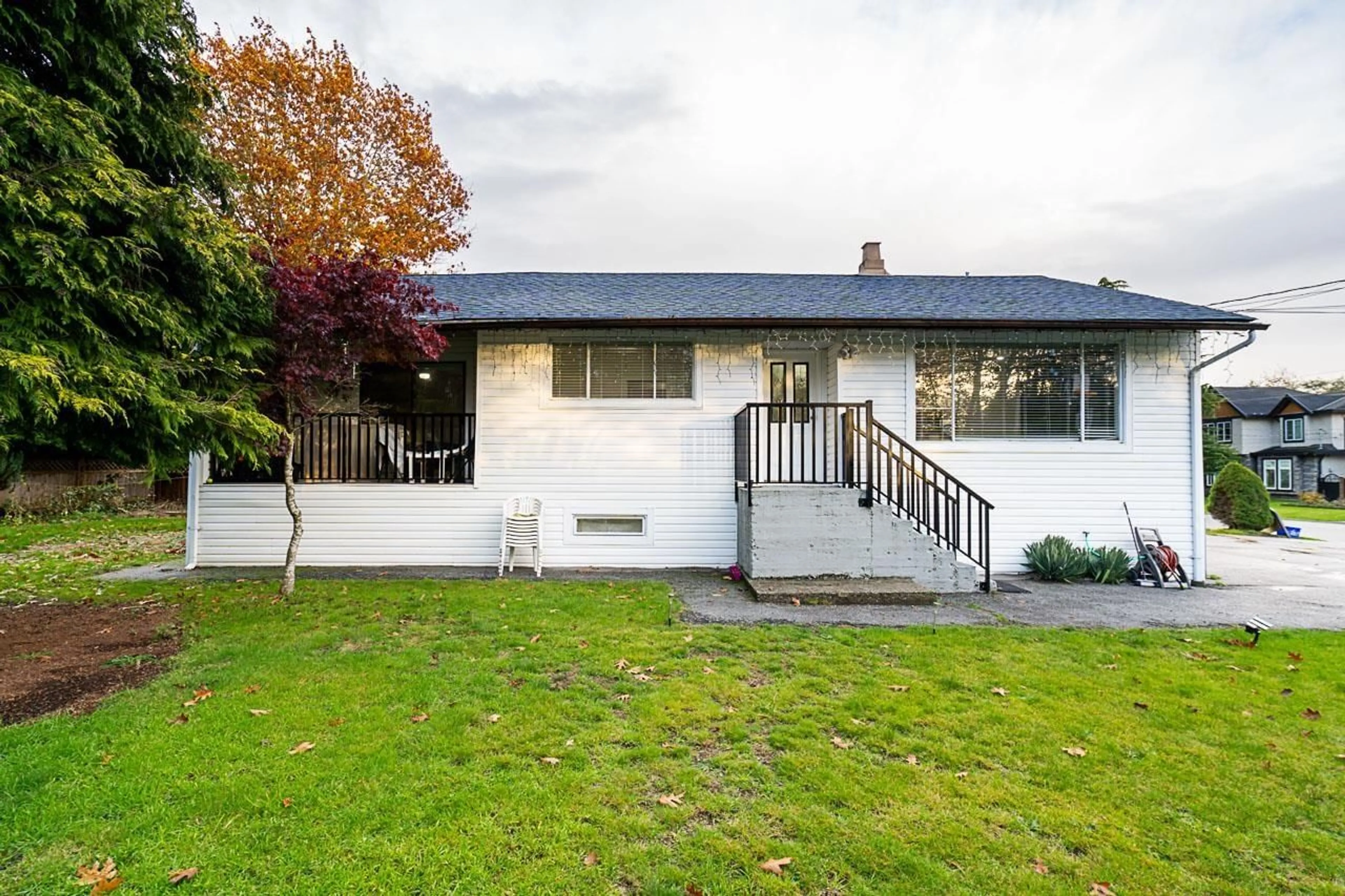 A pic from outside/outdoor area/front of a property/back of a property/a pic from drone, street for 11205 78A AVENUE, Delta British Columbia V4C1P4