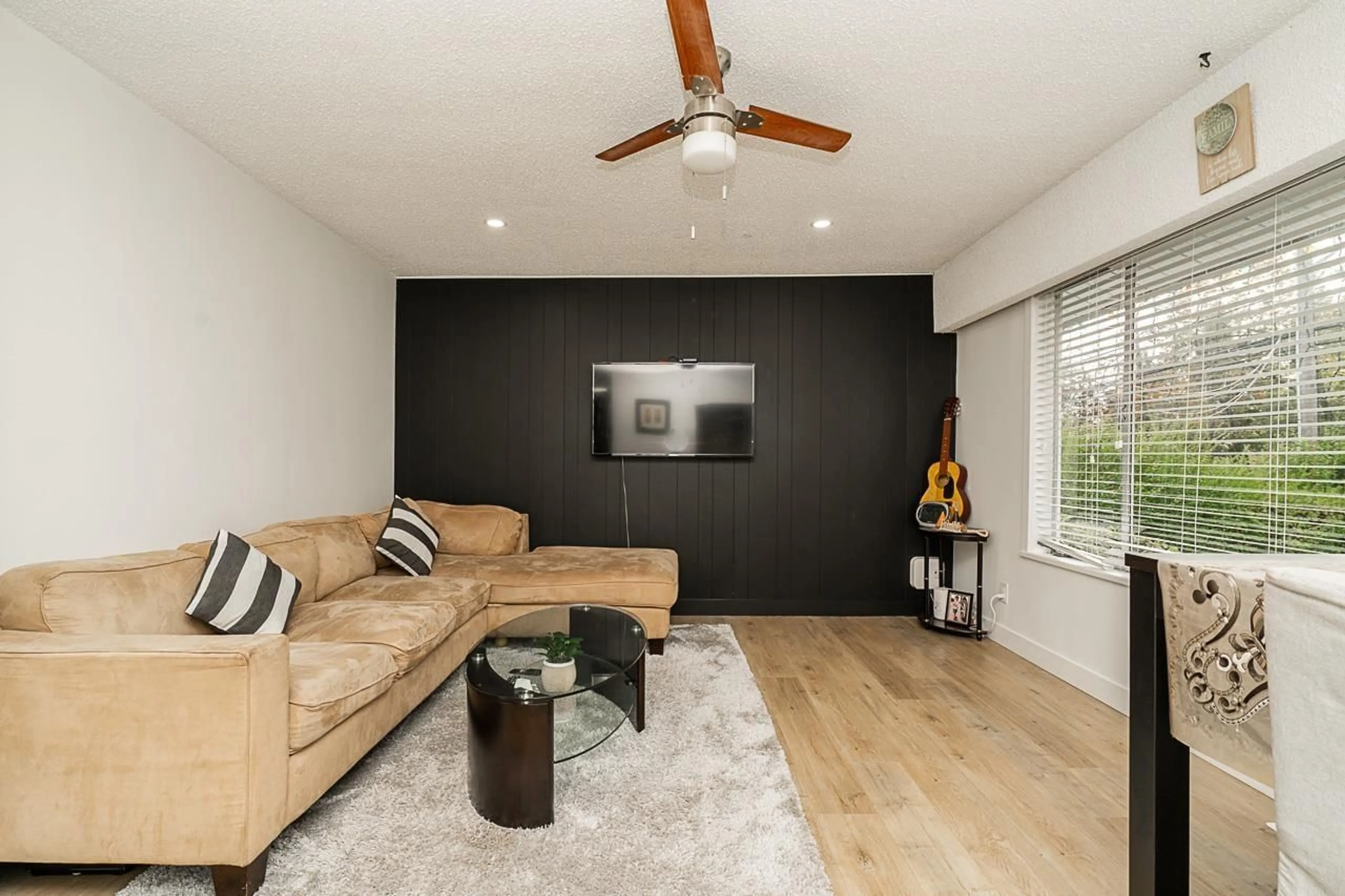 Living room with furniture, wood/laminate floor for 11205 78A AVENUE, Delta British Columbia V4C1P4