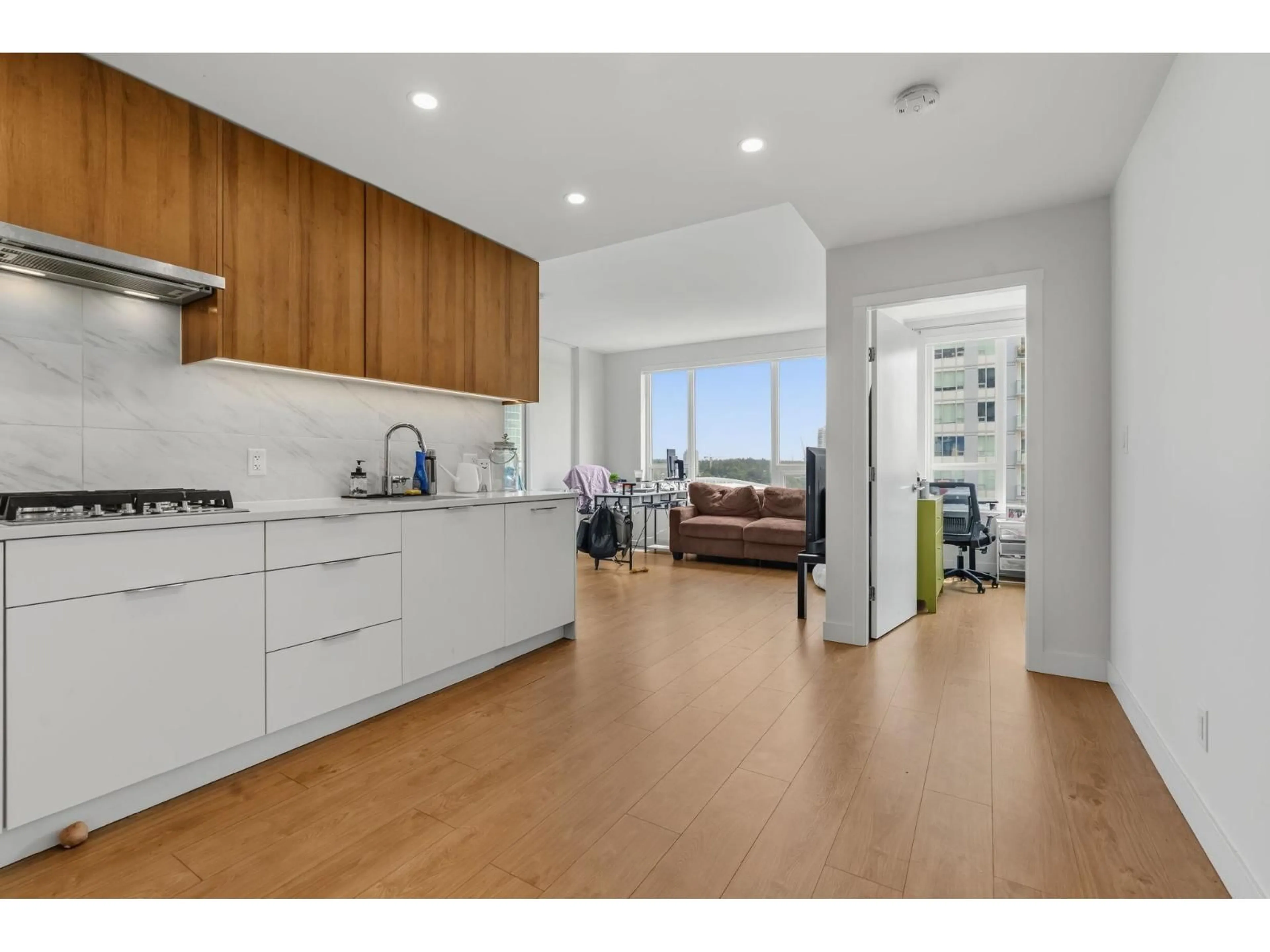 Open concept kitchen, wood/laminate floor for 902 - 13359 OLD YALE ROAD, Surrey British Columbia V3T0S4