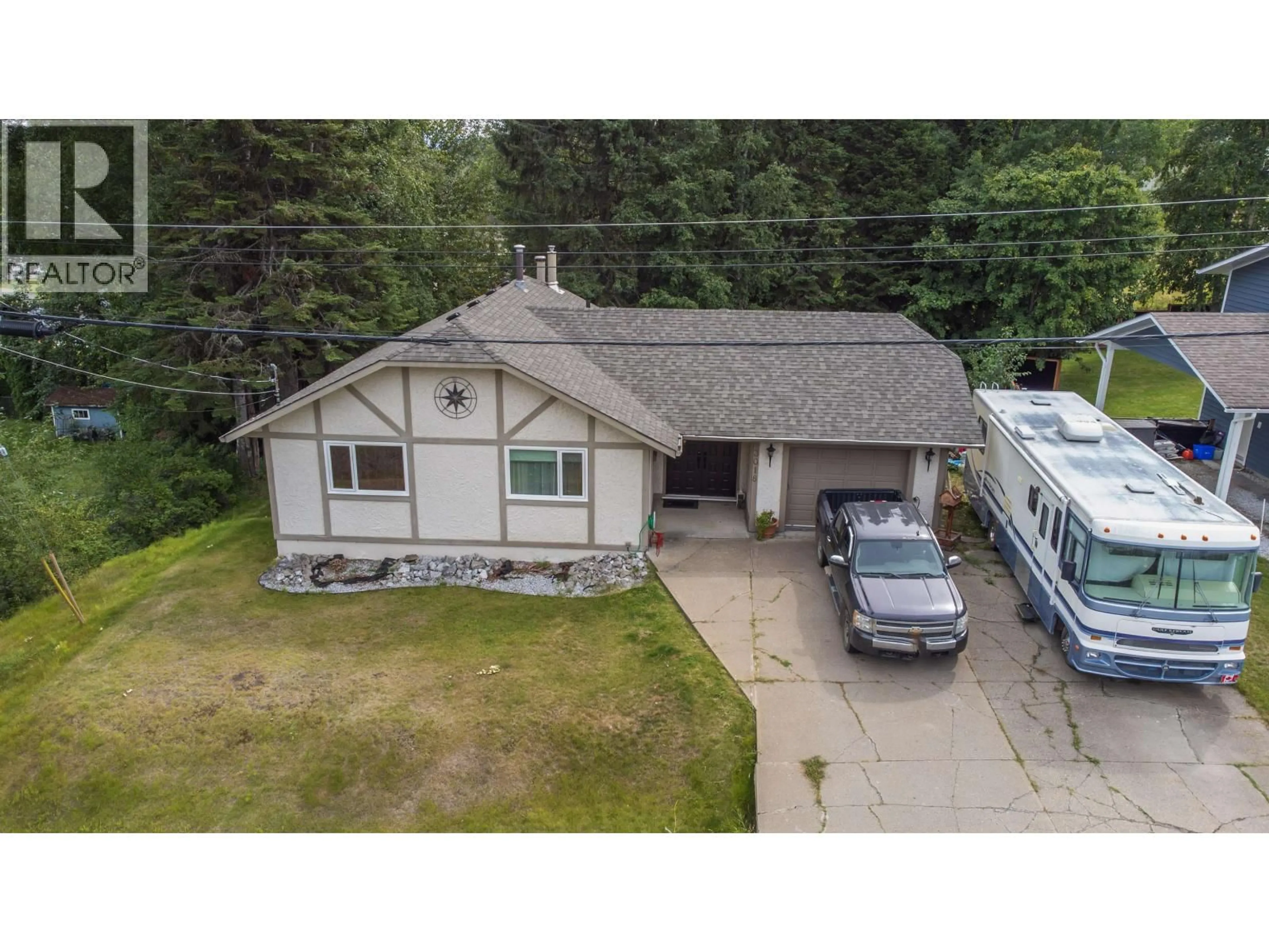 A pic from outside/outdoor area/front of a property/back of a property/a pic from drone, street for 3018 GLADE ROAD, Prince George British Columbia V2K4C3