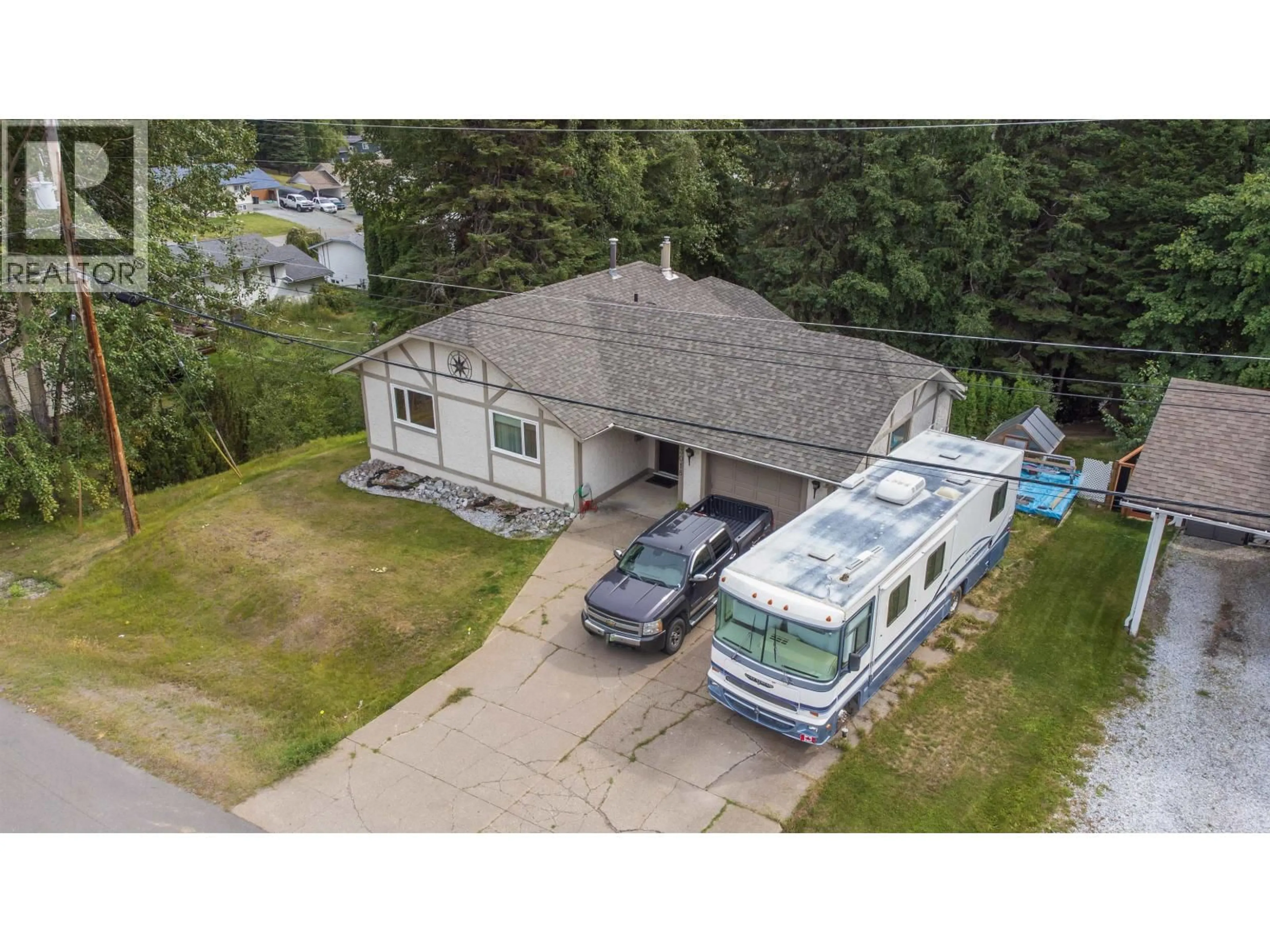 A pic from outside/outdoor area/front of a property/back of a property/a pic from drone, street for 3018 GLADE ROAD, Prince George British Columbia V2K4C3