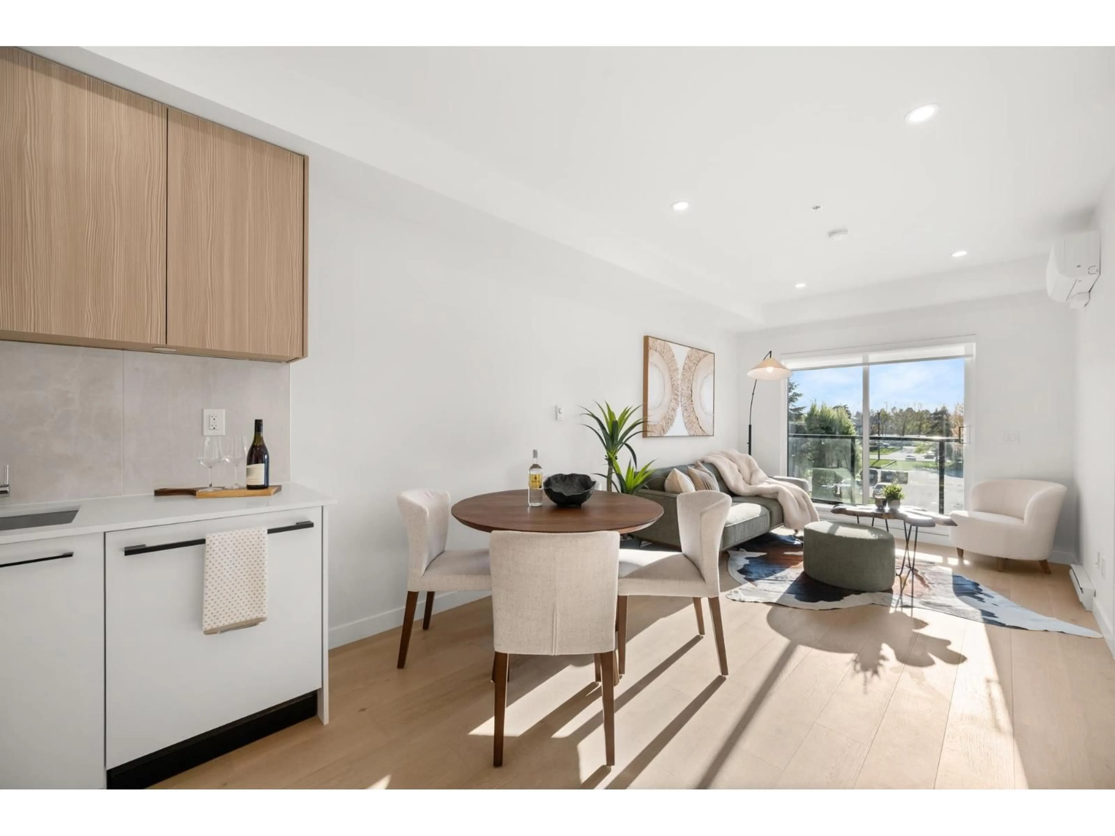 Open concept kitchen, wood/laminate floor for 610 - 5398 207 STREET, Langley British Columbia V3A2E6