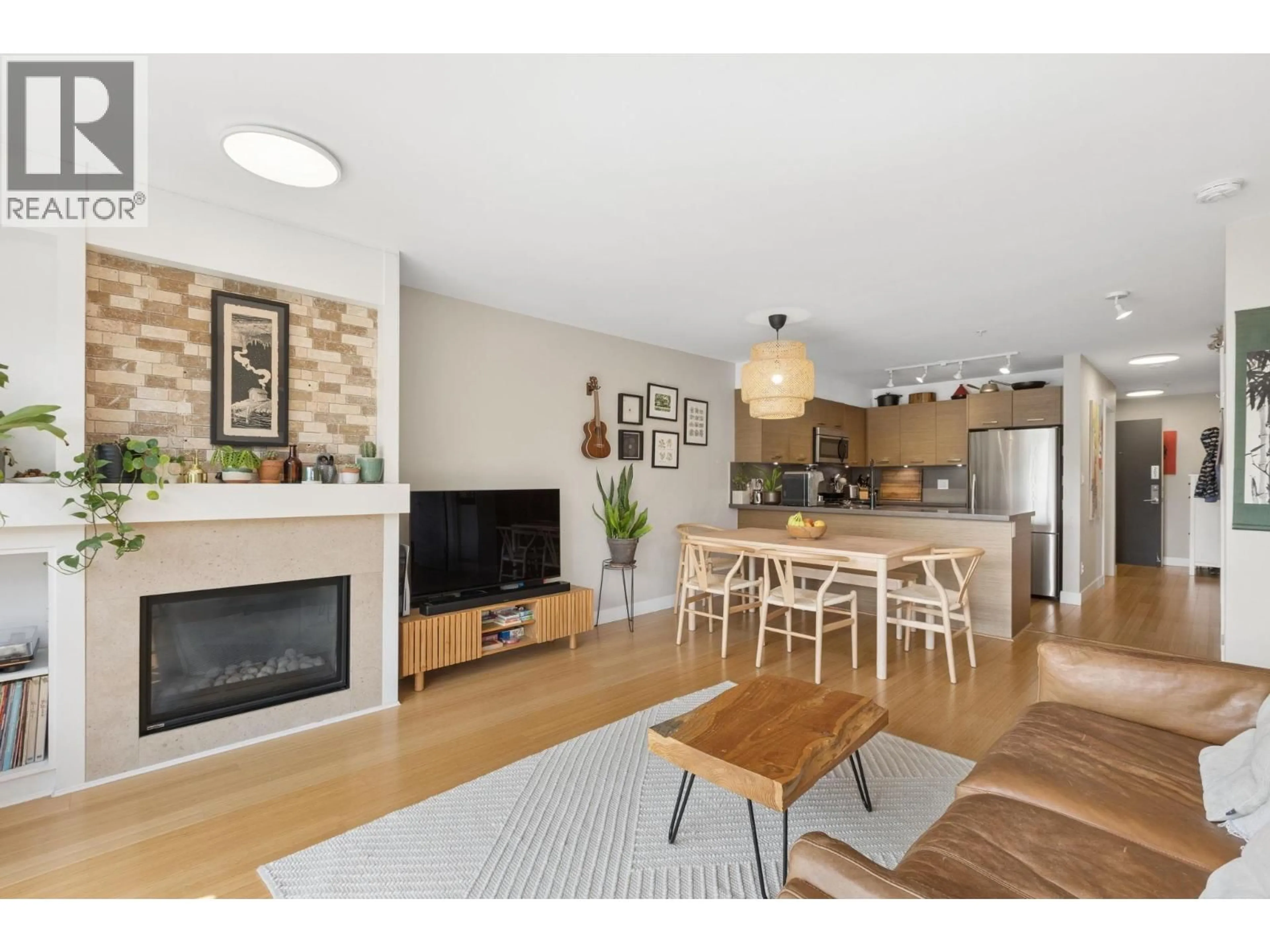 Open concept kitchen, wood/laminate floor for 207 - 3732 MT SEYMOUR PARKWAY, North Vancouver British Columbia V7G1C3