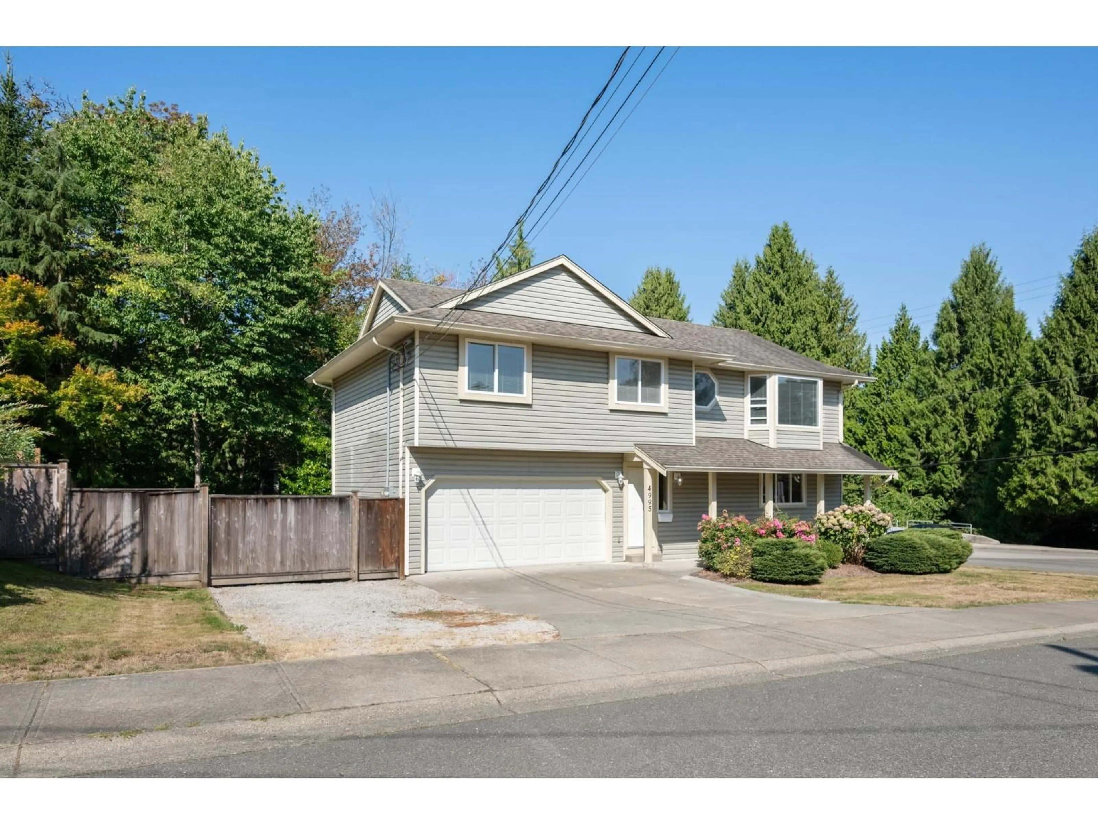 A pic from outside/outdoor area/front of a property/back of a property/a pic from drone, street for 4995 202A STREET, Langley British Columbia V3A1T6