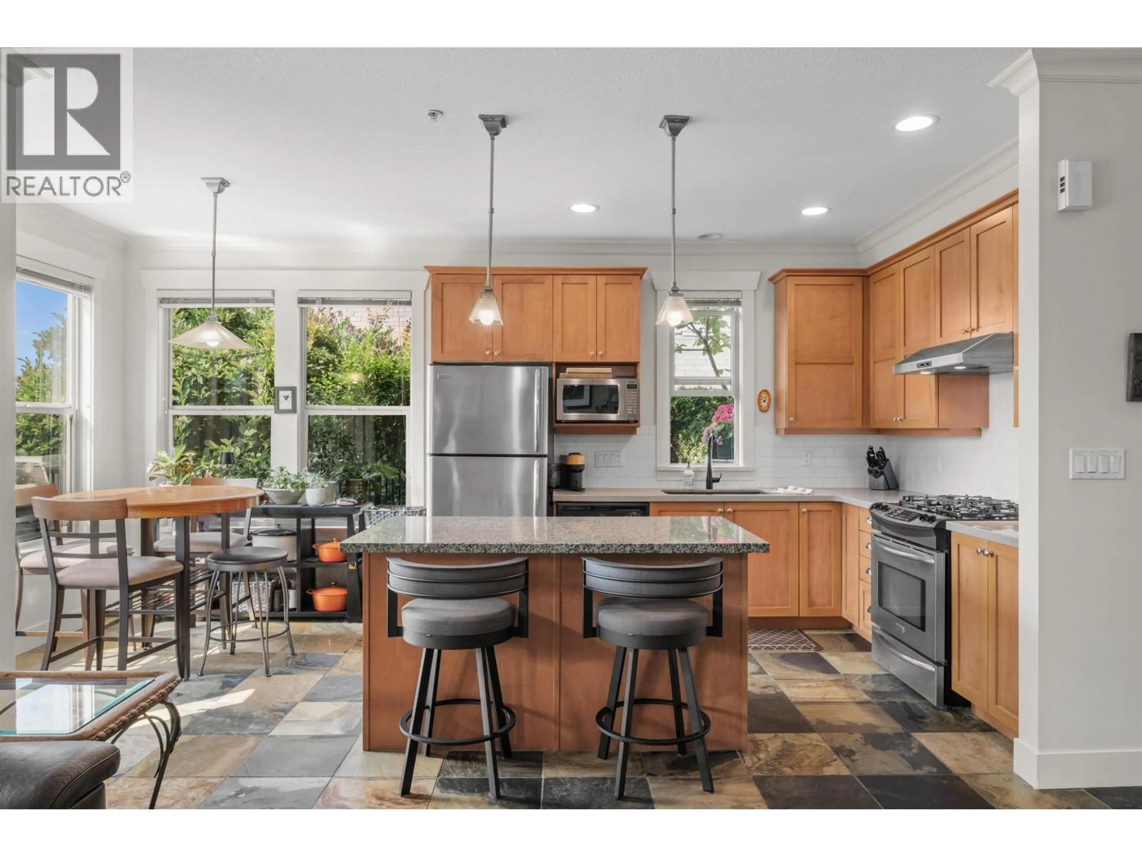 Open concept kitchen, ceramic/tile floor for 261 QUEENS ROAD, North Vancouver British Columbia V7N4N7