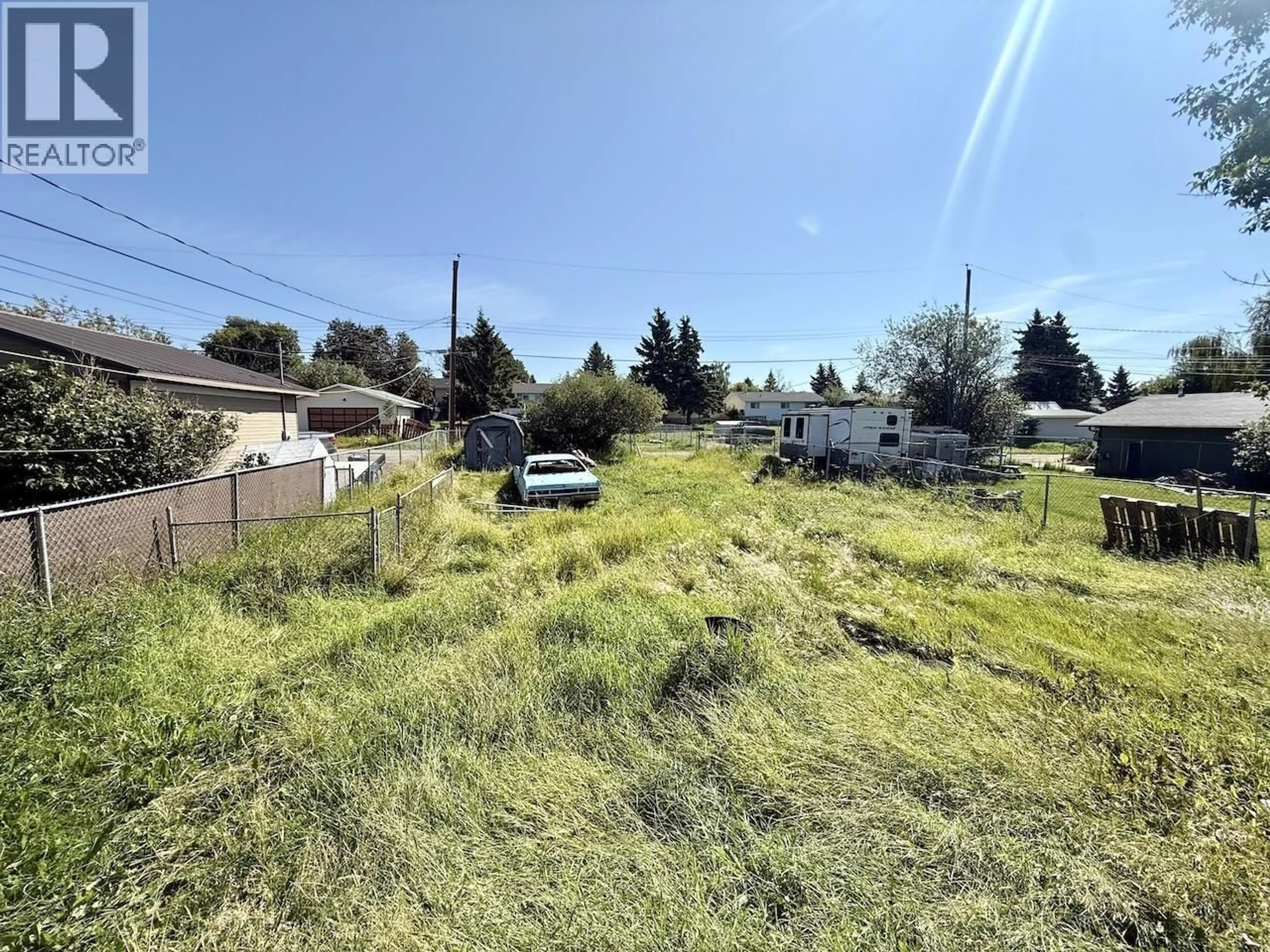 A pic from outside/outdoor area/front of a property/back of a property/a pic from drone, unknown for 9203 91 STREET, Fort St. John British Columbia V1J4V4