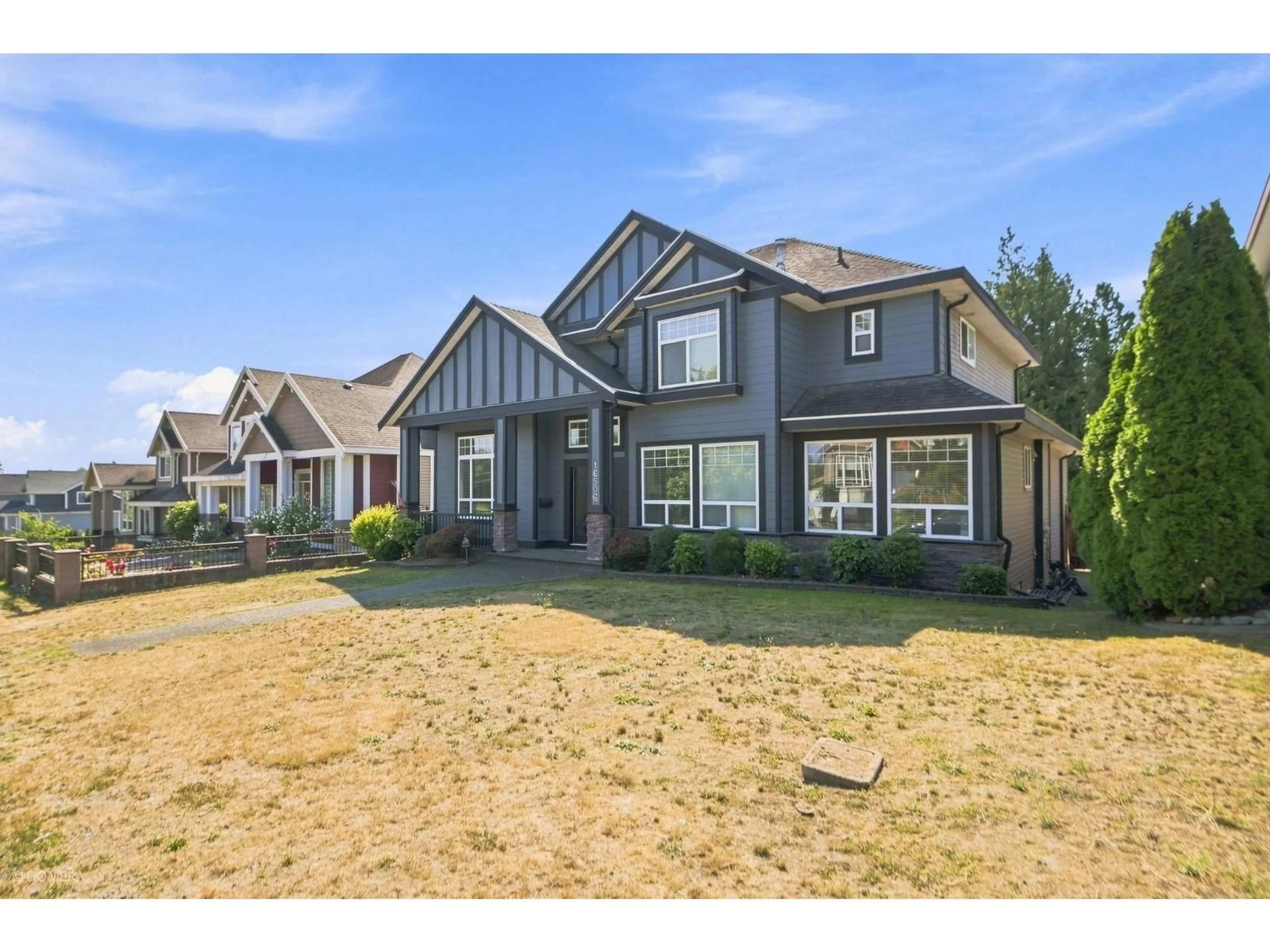 Home with vinyl exterior material, street for 16506 104 AVENUE, Surrey British Columbia V4N1Y5