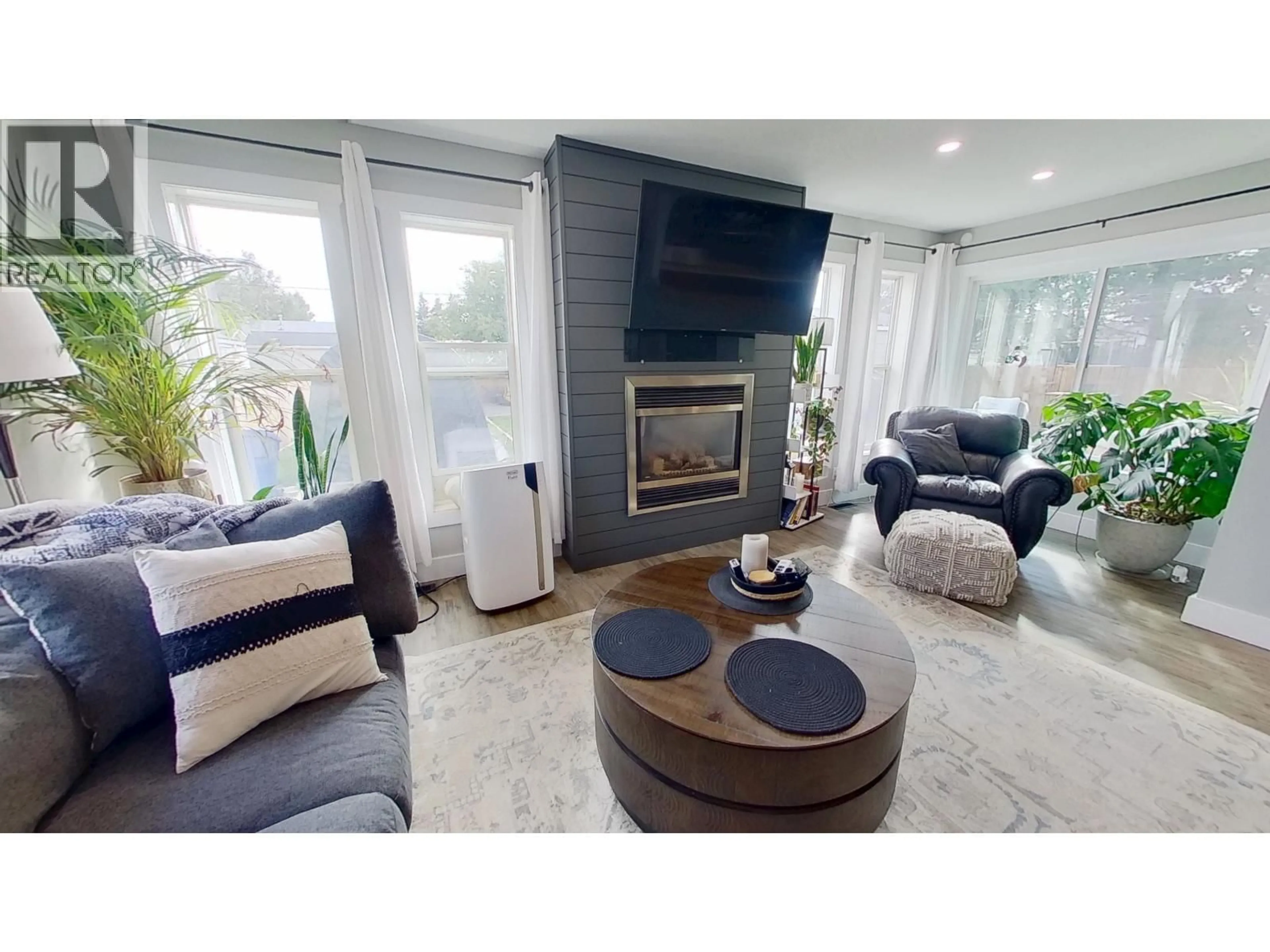 Living room with furniture, unknown for 9207 108 AVENUE, Fort St. John British Columbia V1J2P7