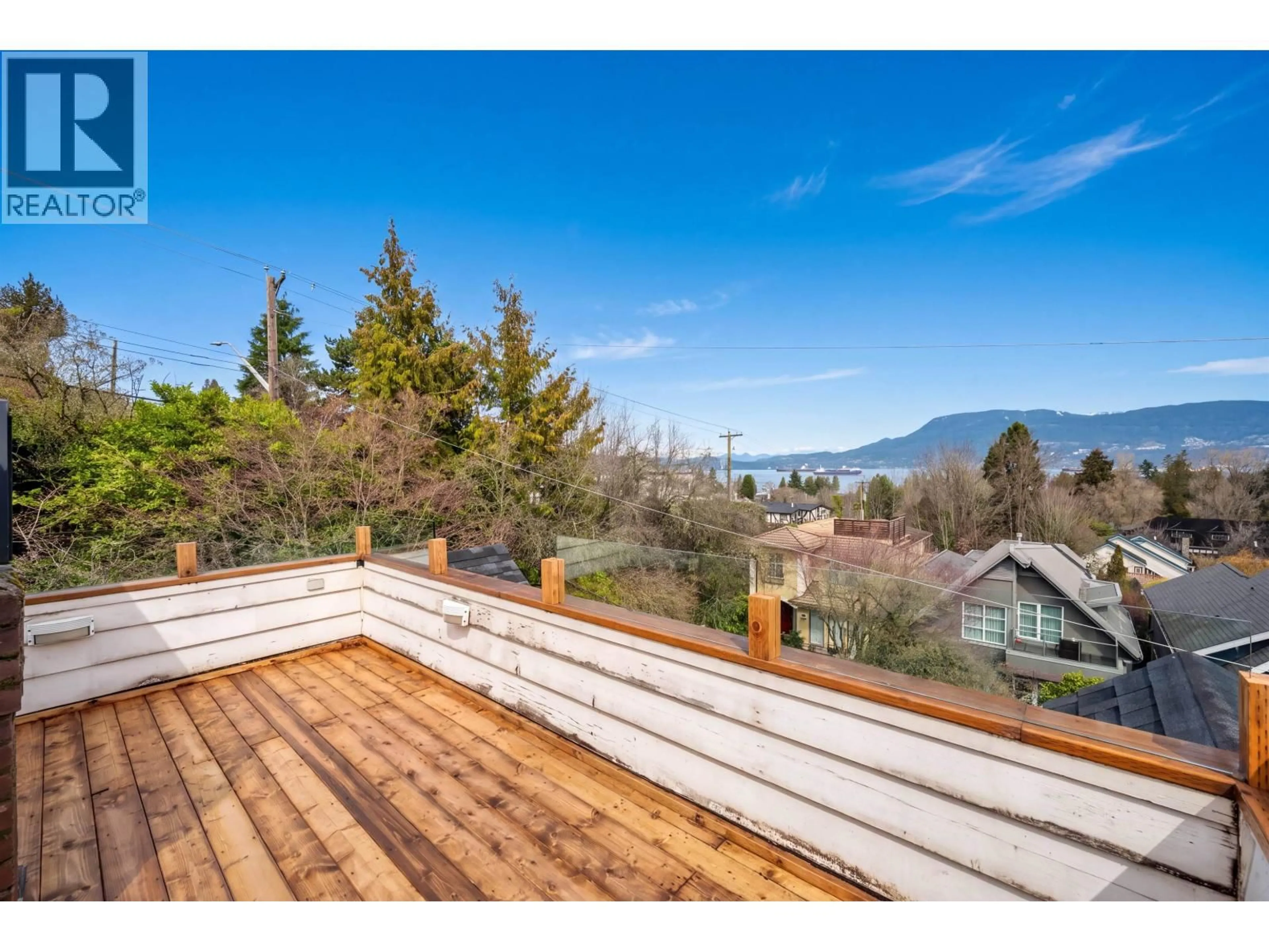 A pic from outside/outdoor area/front of a property/back of a property/a pic from drone, mountain view for 4396 LOCARNO CRESCENT, Vancouver British Columbia V6R1G3