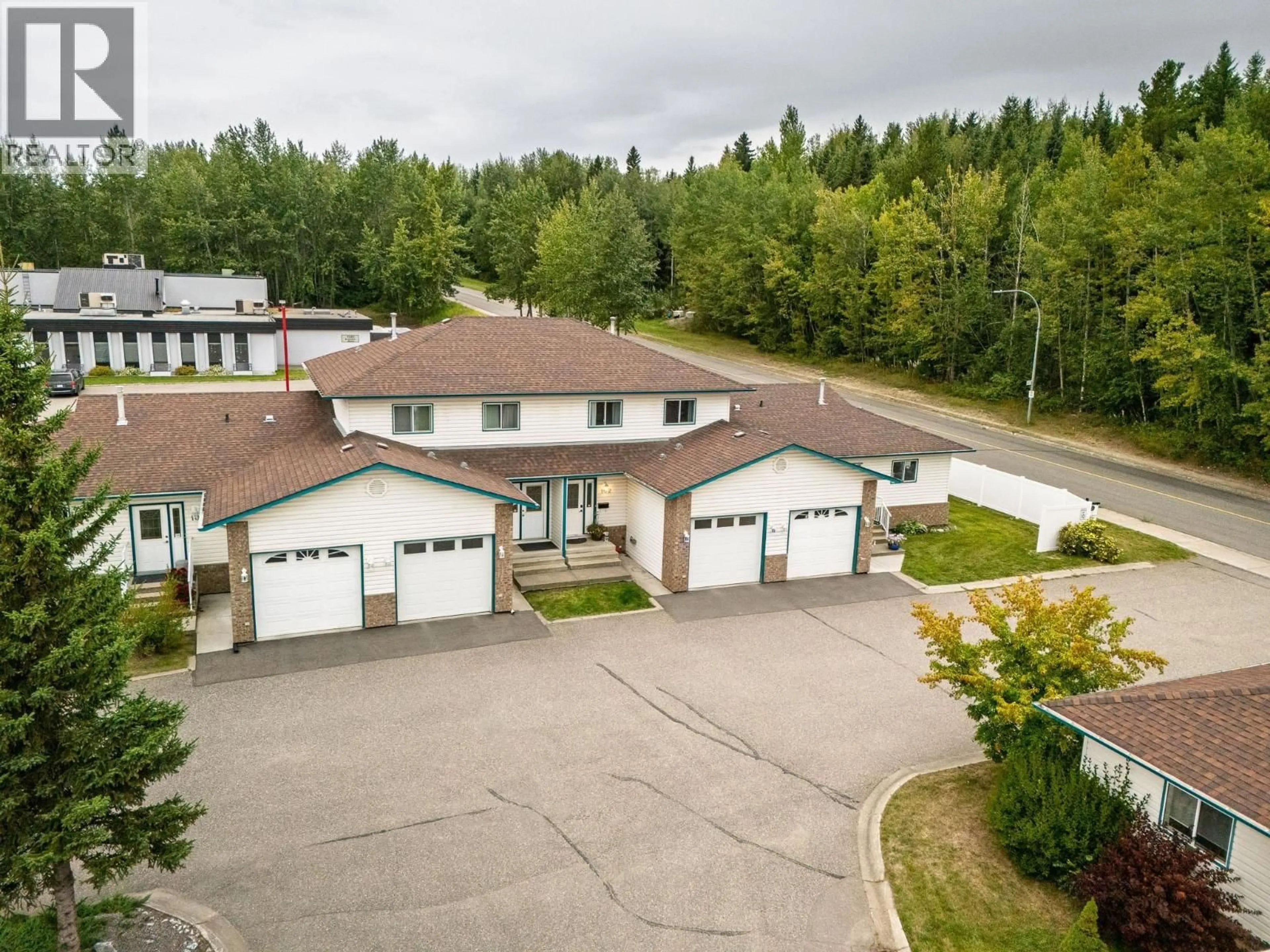 A pic from outside/outdoor area/front of a property/back of a property/a pic from drone, unknown for 102 - 7180 ST LAWRENCE AVENUE, Prince George British Columbia V2N5C6