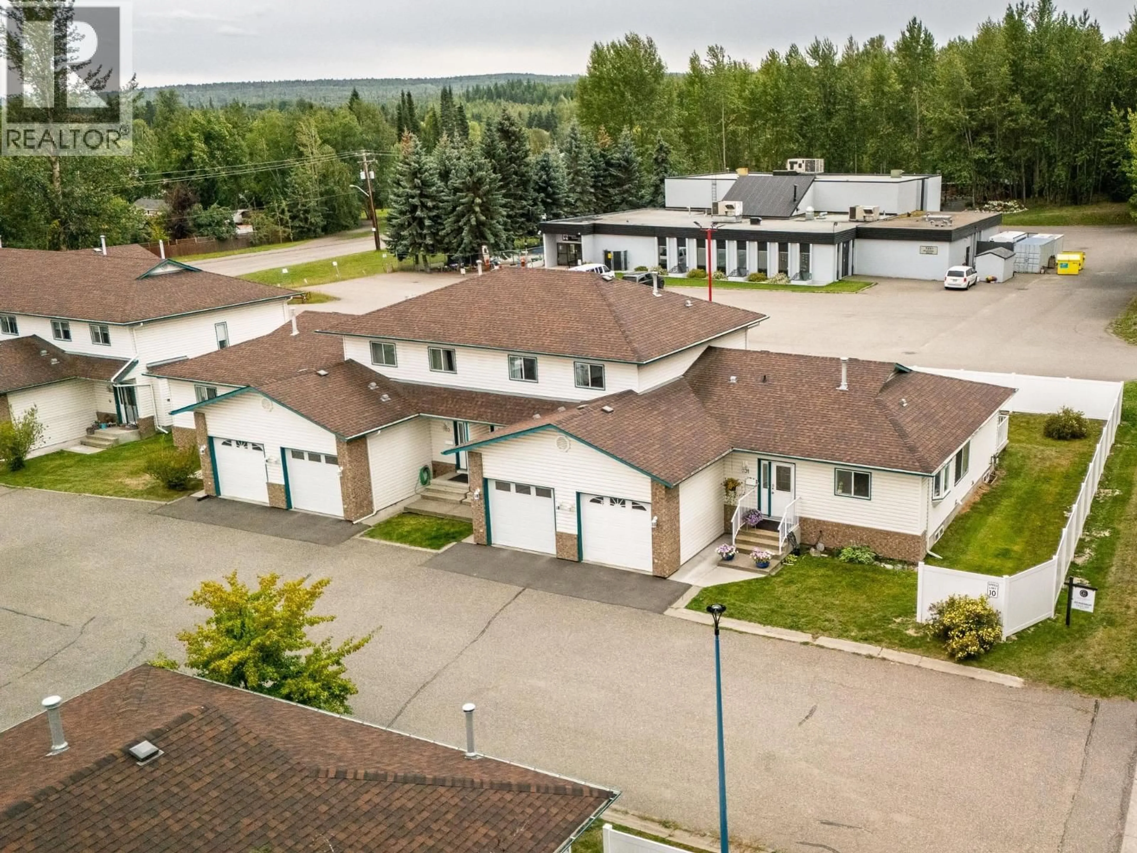 A pic from outside/outdoor area/front of a property/back of a property/a pic from drone, building for 102 - 7180 ST LAWRENCE AVENUE, Prince George British Columbia V2N5C6