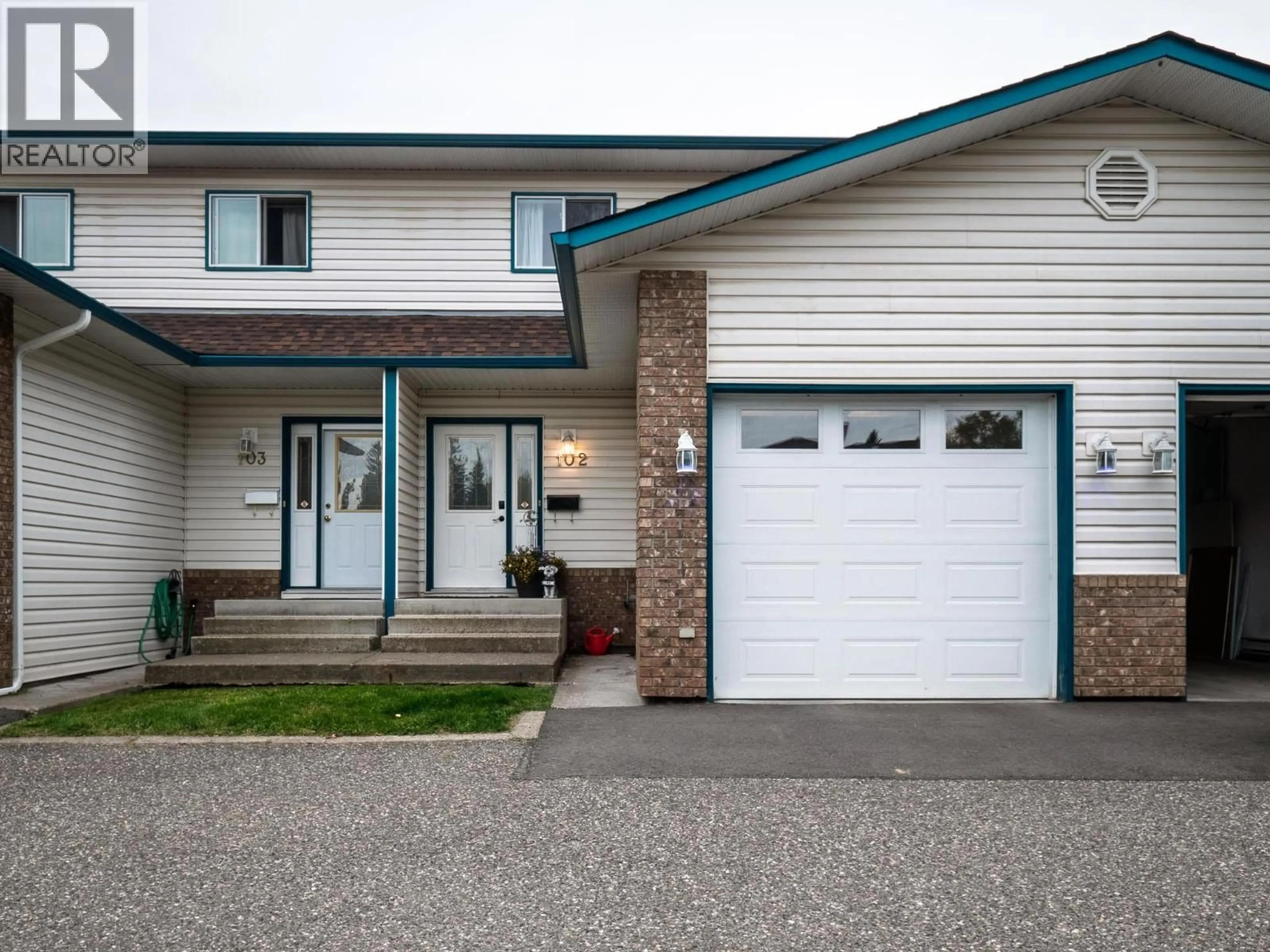 Home with vinyl exterior material, street for 102 - 7180 ST LAWRENCE AVENUE, Prince George British Columbia V2N5C6