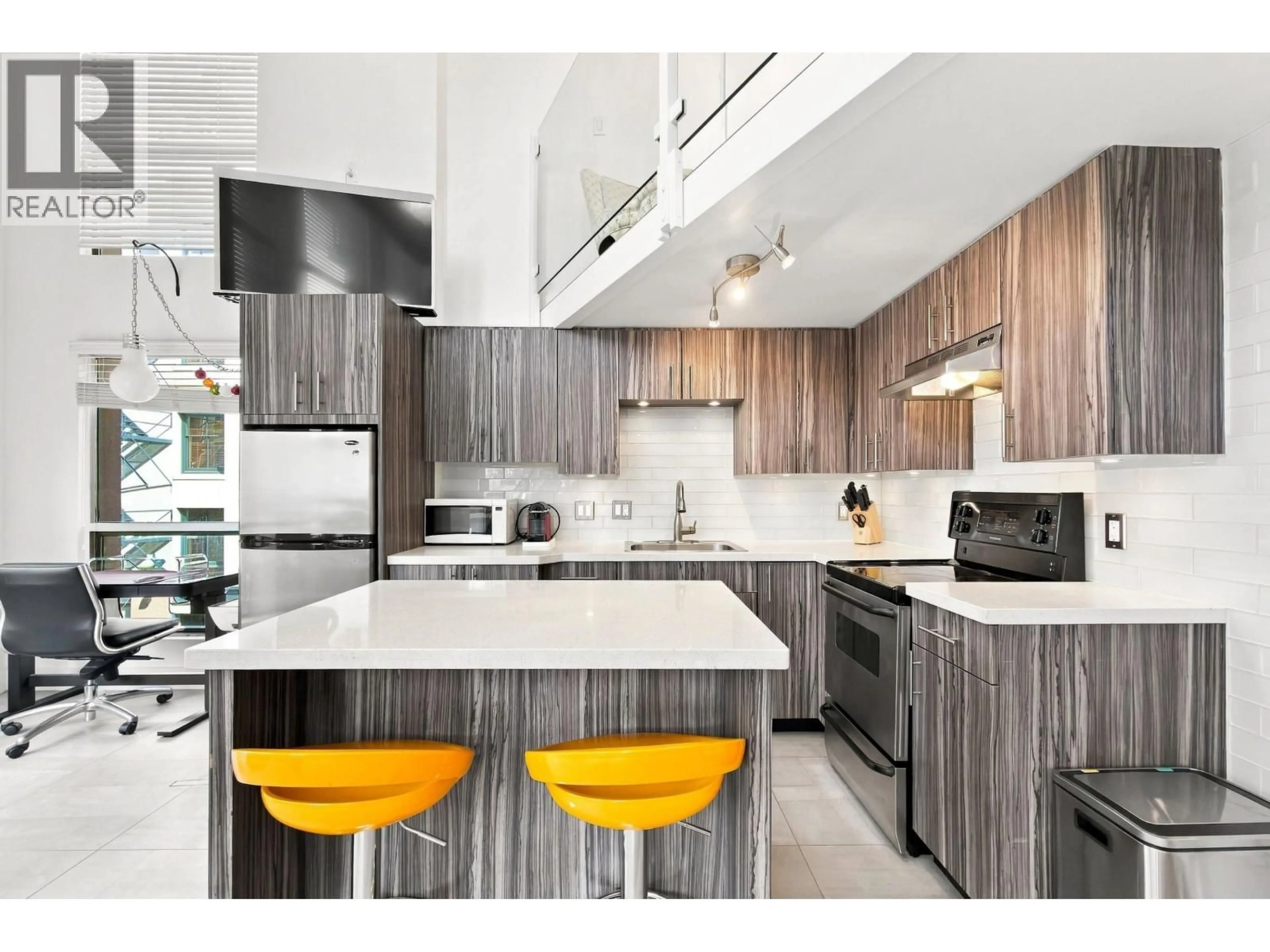 Contemporary kitchen, wood/laminate floor for 311 - 1 CORDOVA STREET, Vancouver British Columbia V6A4H3