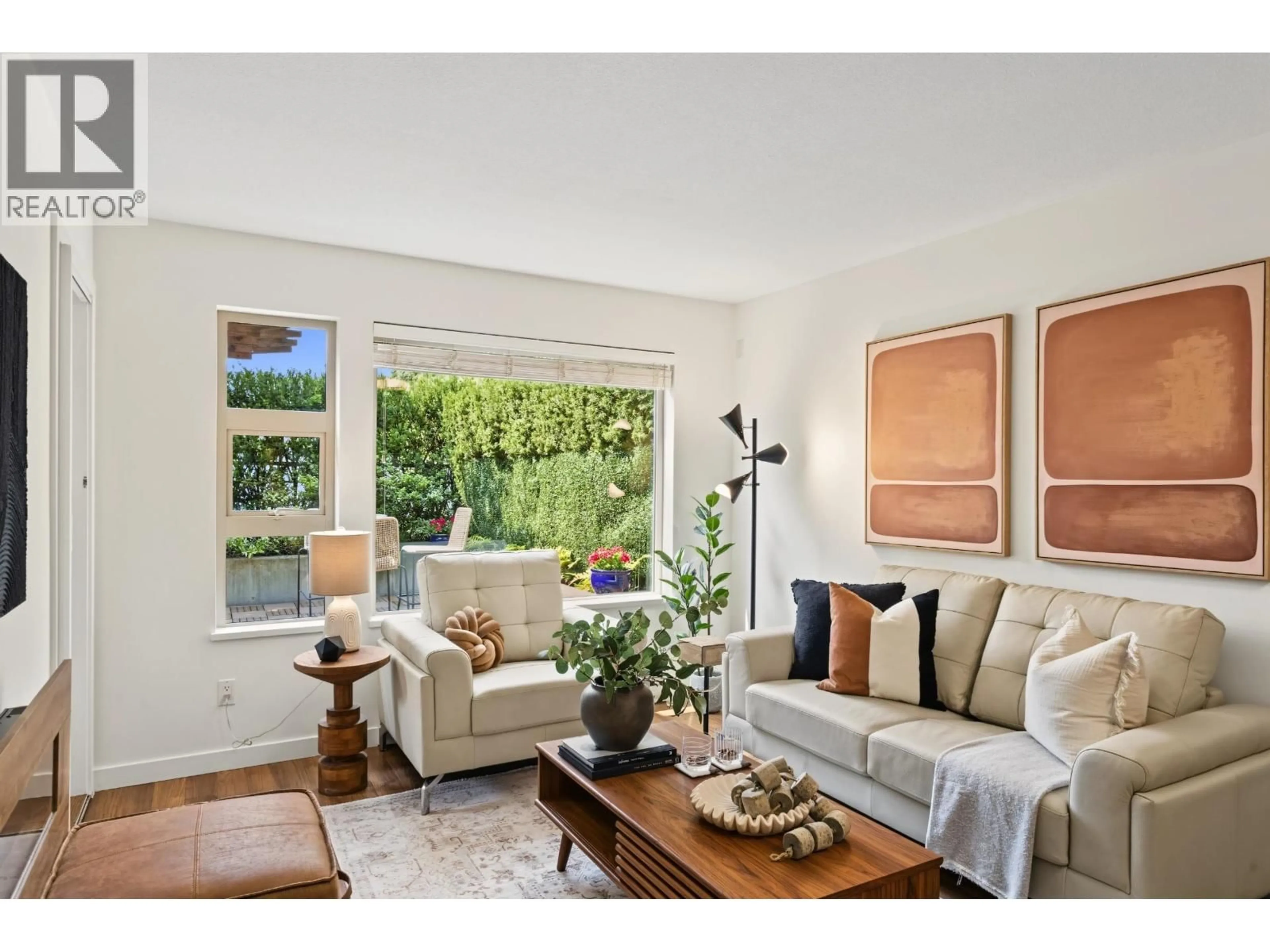 Living room with furniture, unknown for 210 - 1677 LLOYD AVENUE, North Vancouver British Columbia V7P0B1