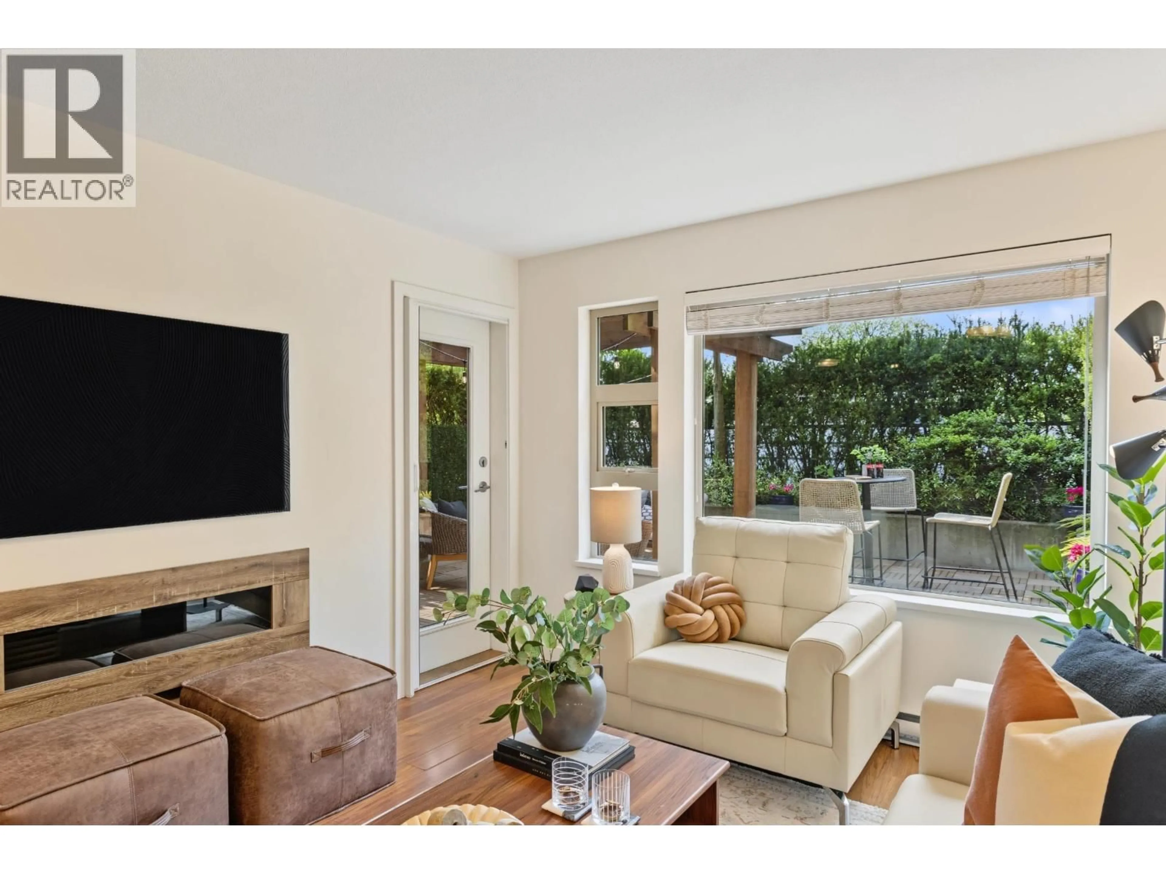 Living room with furniture, unknown for 210 - 1677 LLOYD AVENUE, North Vancouver British Columbia V7P0B1