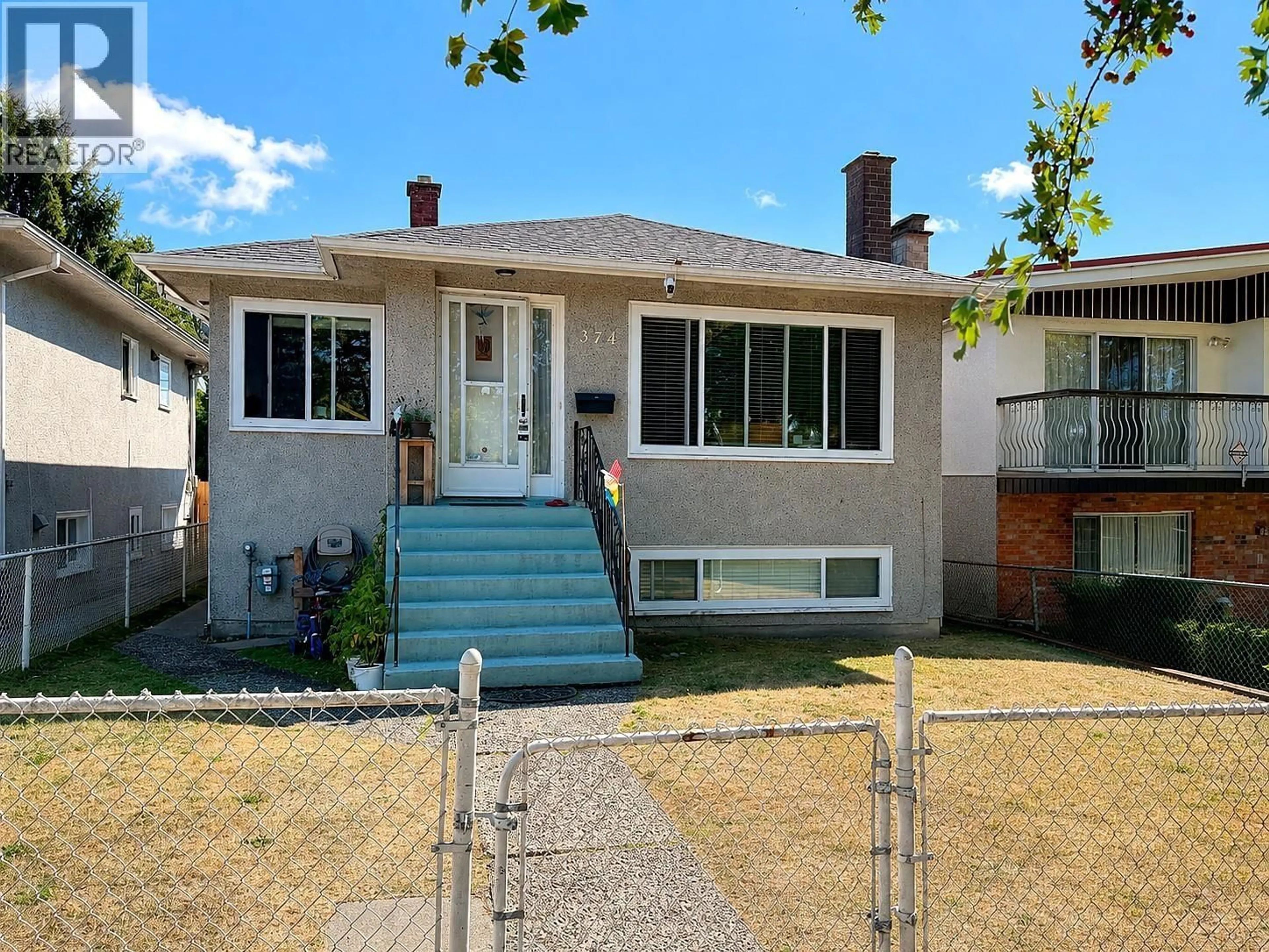 Home with vinyl exterior material, street for 374 54TH AVENUE, Vancouver British Columbia V5X1L2