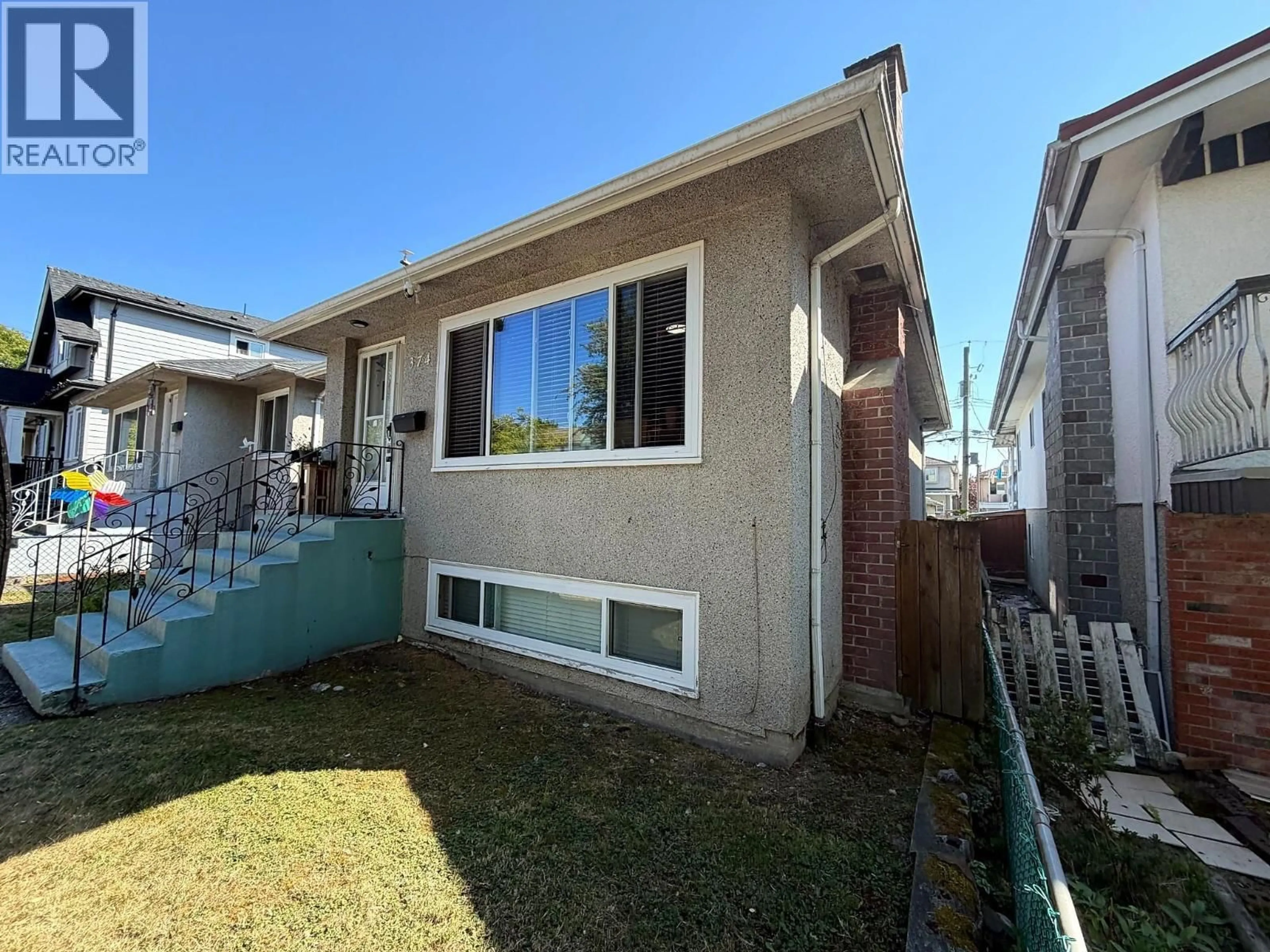 Home with vinyl exterior material, street for 374 54TH AVENUE, Vancouver British Columbia V5X1L2