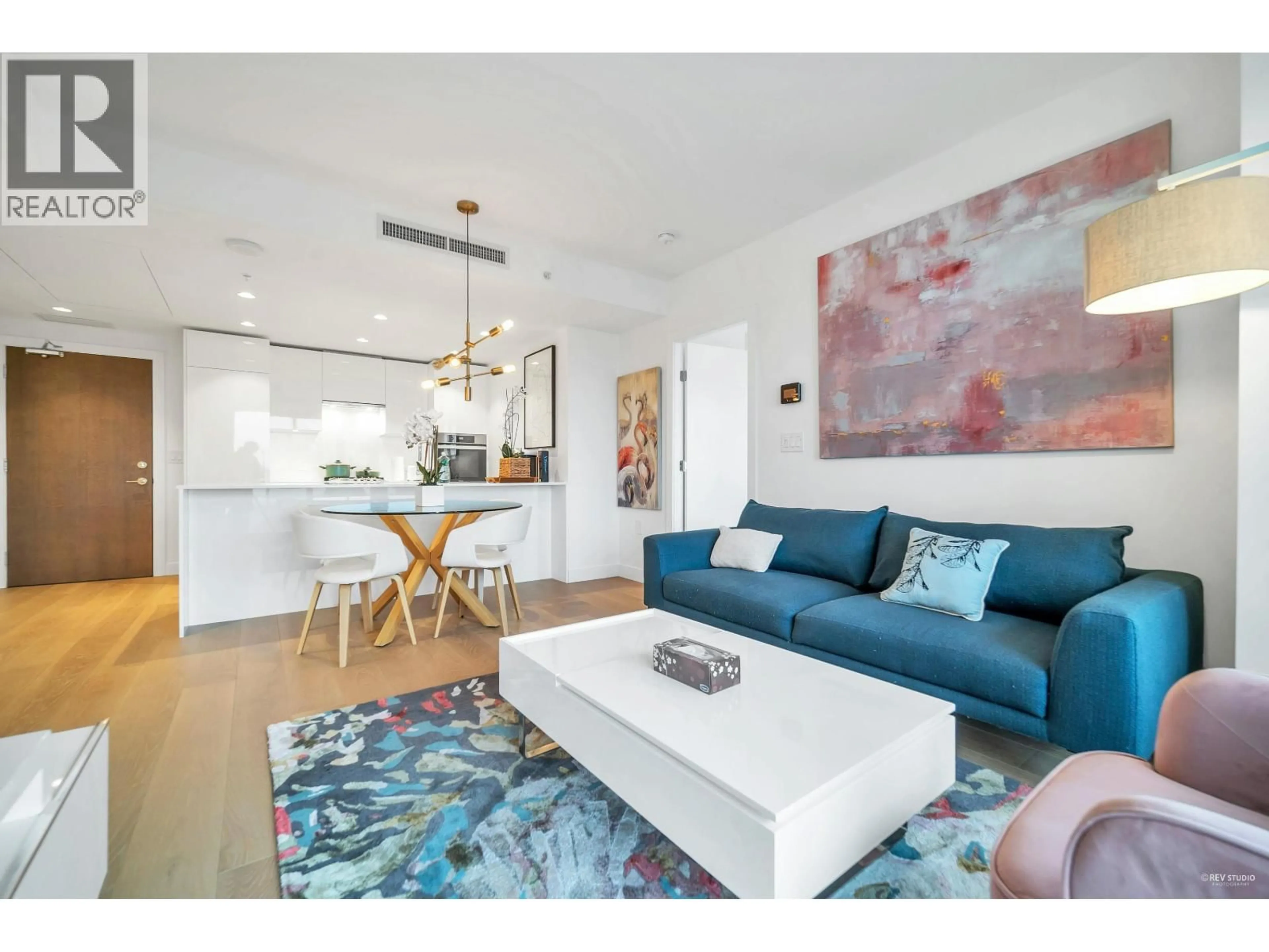 Living room with furniture, wood/laminate floor for 811 - 5788 GILBERT ROAD, Richmond British Columbia V7C0G1