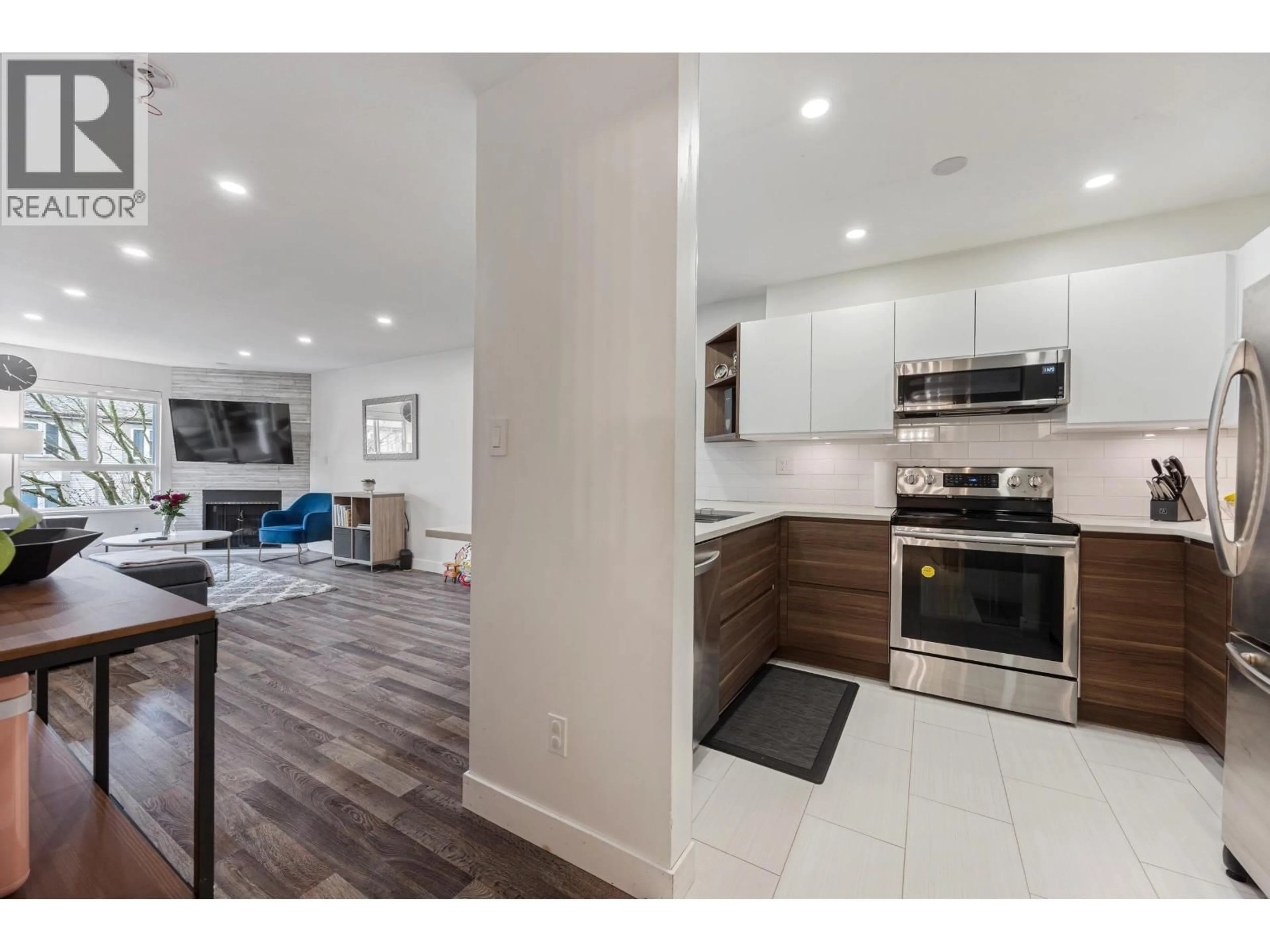 Open concept kitchen, unknown for 205 - 7465 SANDBORNE AVENUE, Burnaby British Columbia V3N4W7