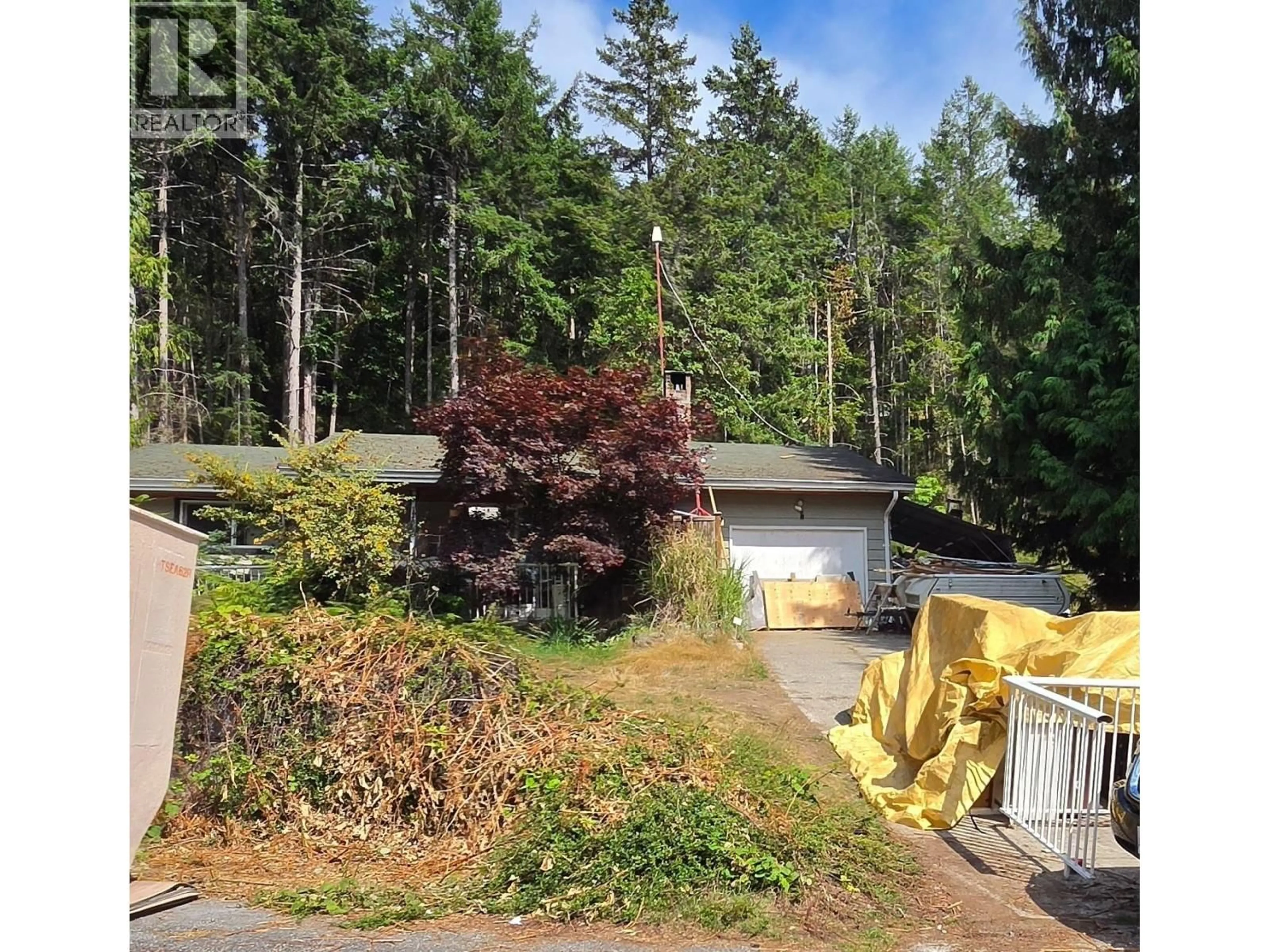 A pic from outside/outdoor area/front of a property/back of a property/a pic from drone, forest/trees view for 12888 FRONT ROAD, Madeira Park British Columbia V0N2H1