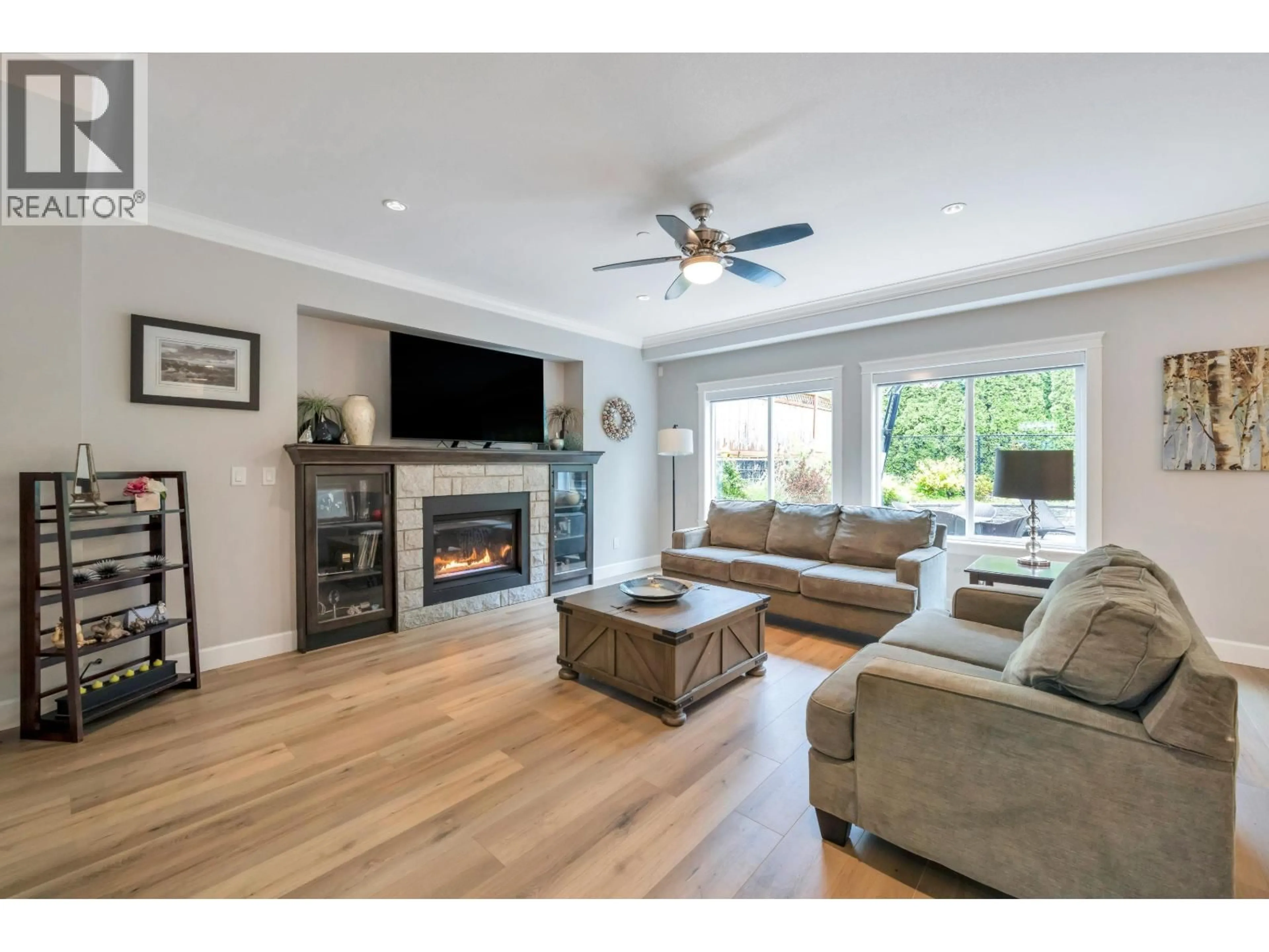 Living room with furniture, wood/laminate floor for 24640 101 AVENUE, Maple Ridge British Columbia V2W0H1