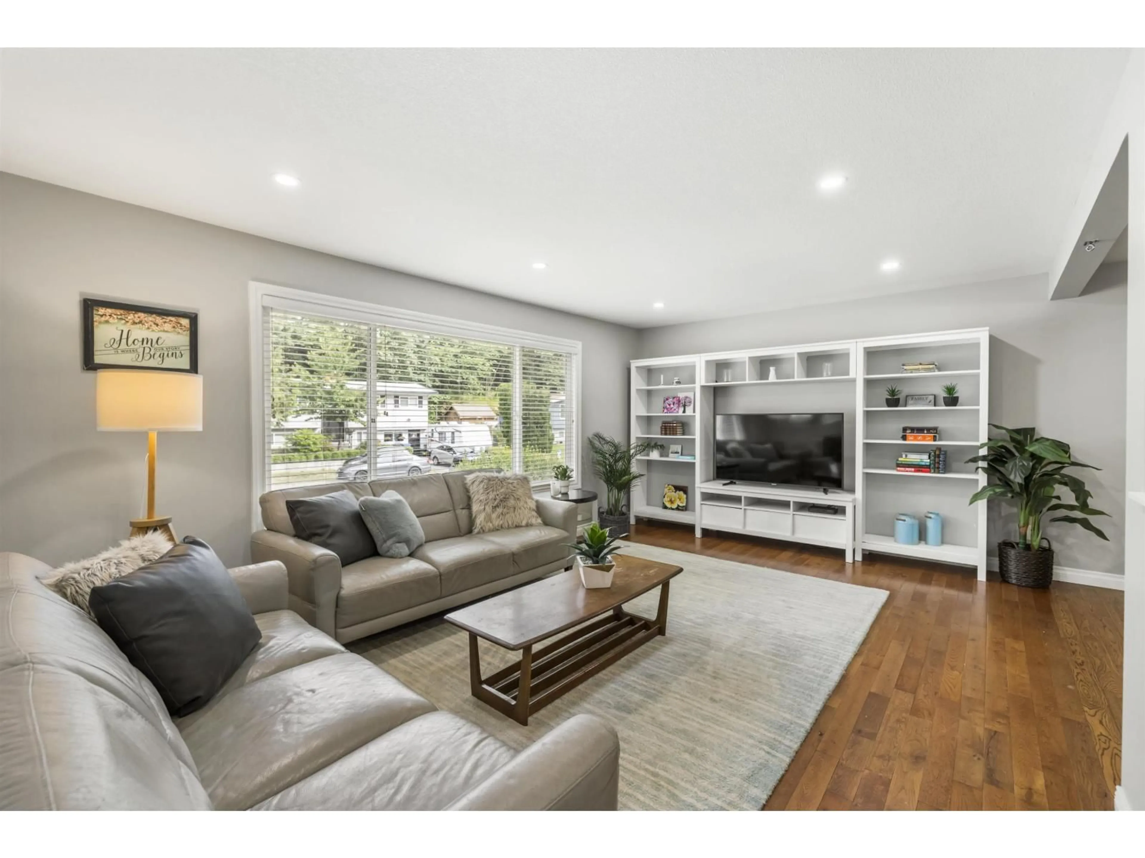 Living room with furniture, wood/laminate floor for 2454 ALADDIN CRESCENT, Abbotsford British Columbia V2S5K7