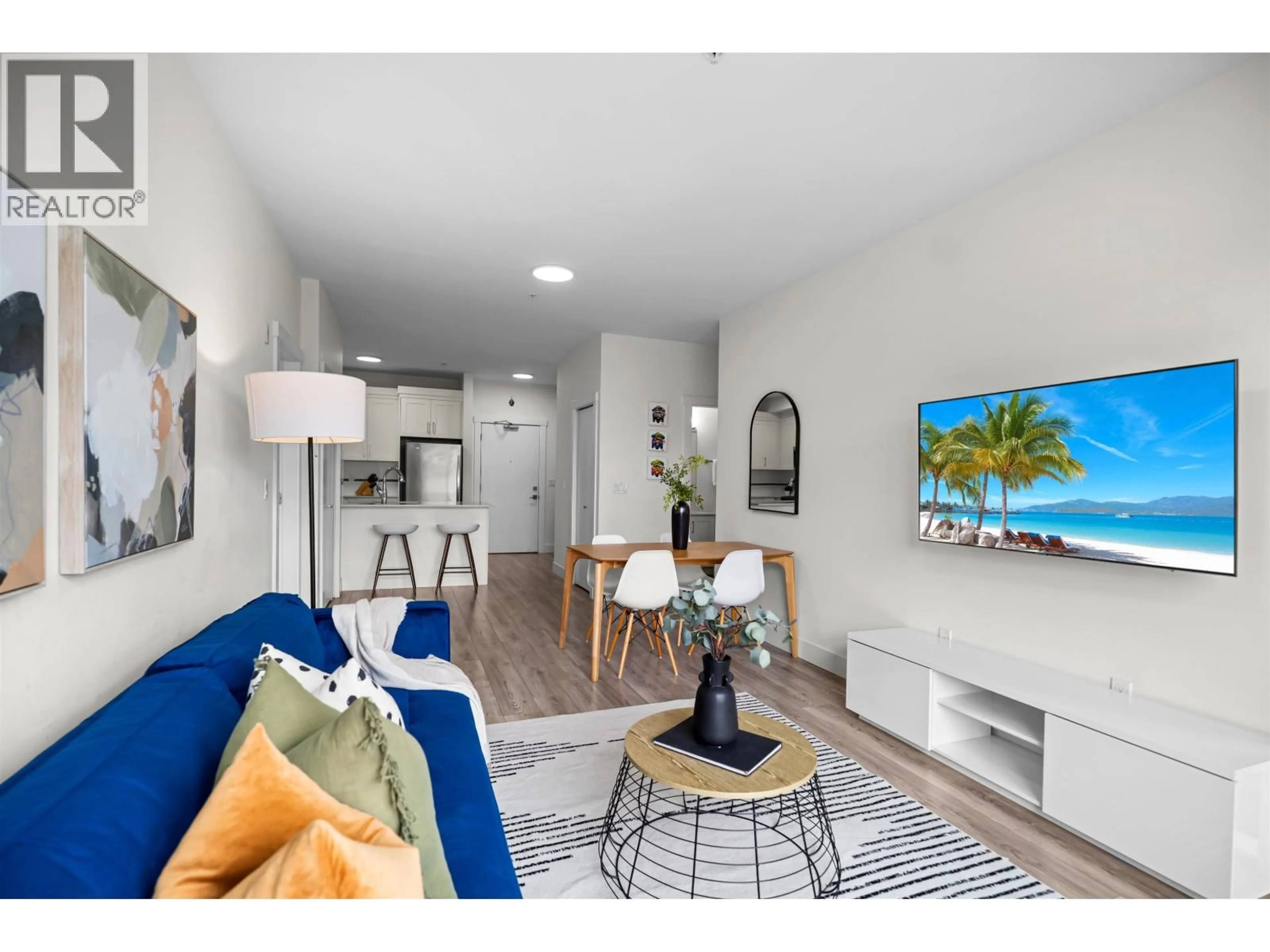 Living room with furniture, wood/laminate floor for 202 - 22577 ROYAL CRESCENT, Maple Ridge British Columbia V2X2M2