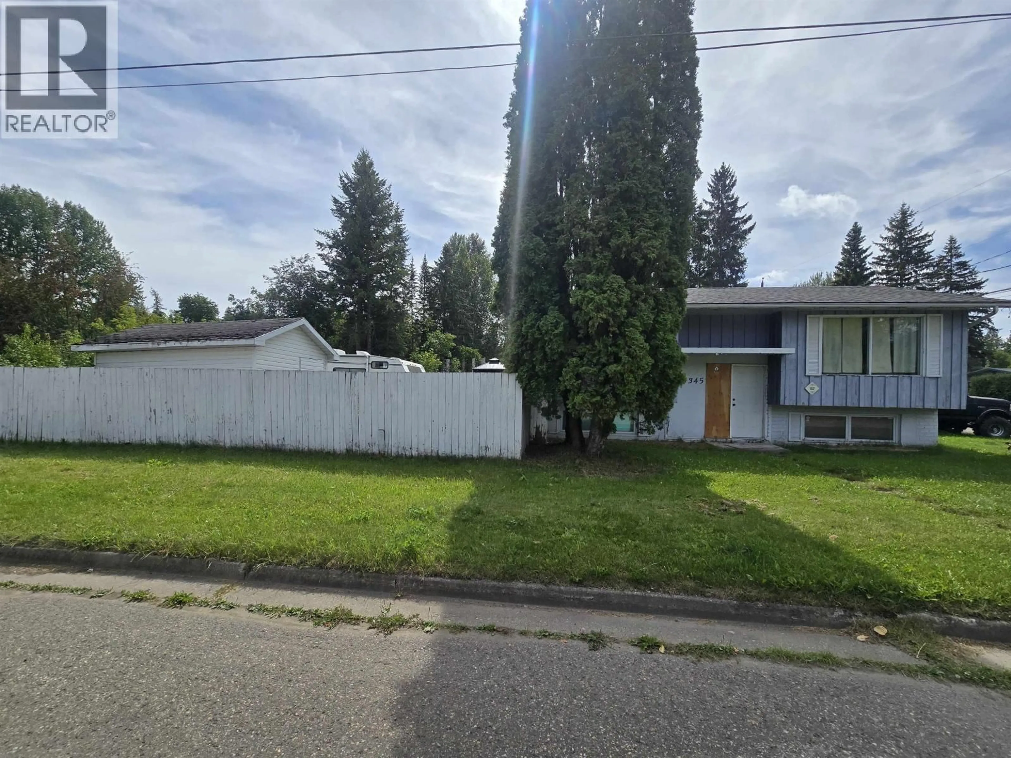 A pic from outside/outdoor area/front of a property/back of a property/a pic from drone, street for 1345 DIEFENBAKER DRIVE, Prince George British Columbia V2L4H6