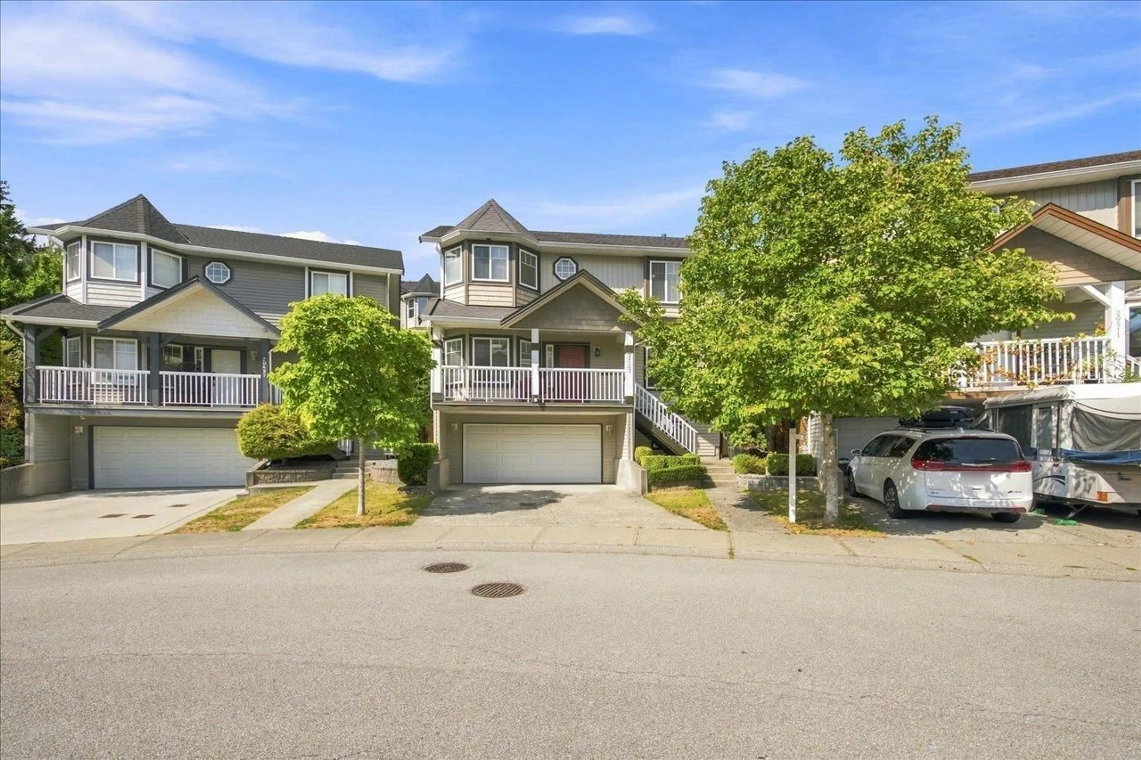 A pic from outside/outdoor area/front of a property/back of a property/a pic from drone, street for 20503 66B AVENUE, Langley British Columbia V2Y2X9