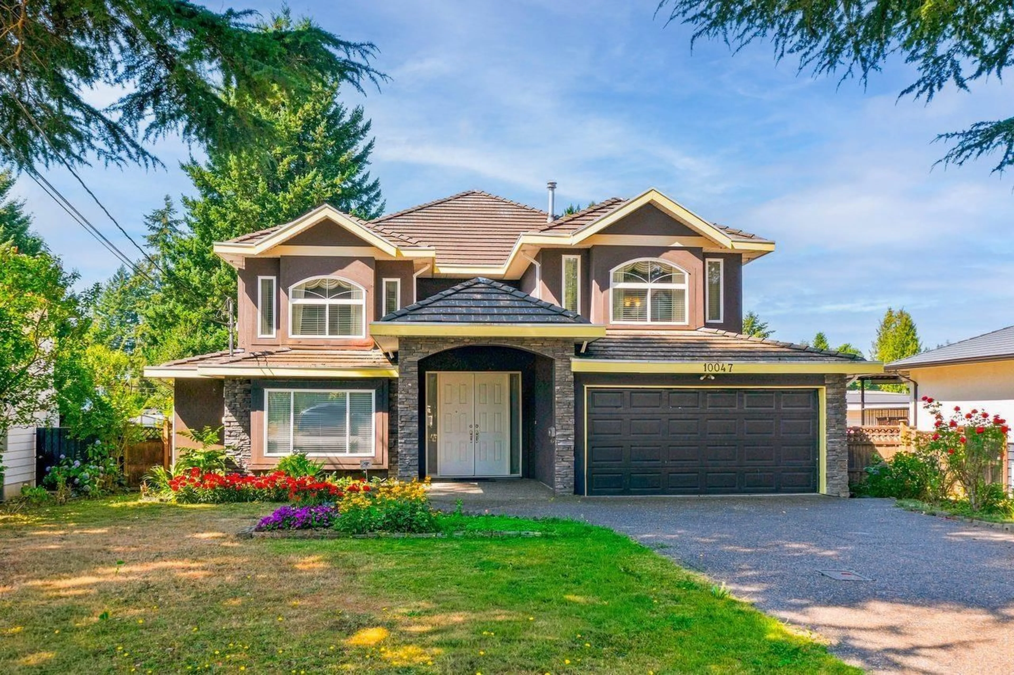 Home with vinyl exterior material, street for 10047 129 STREET, Surrey British Columbia V3T3G6