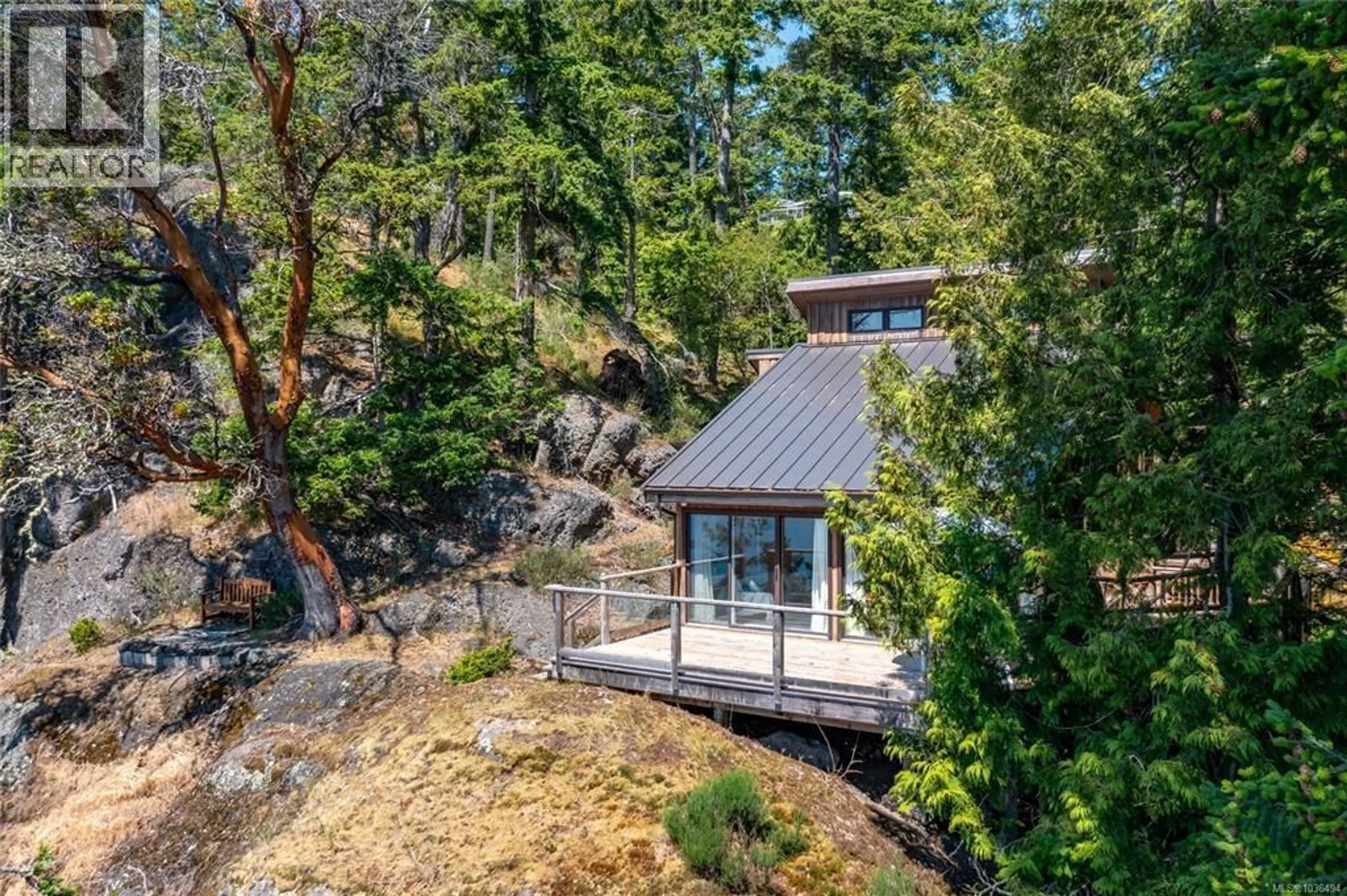 A pic from outside/outdoor area/front of a property/back of a property/a pic from drone, unknown for 3803 CUTLASS COURT, Pender Island British Columbia V0N2M2