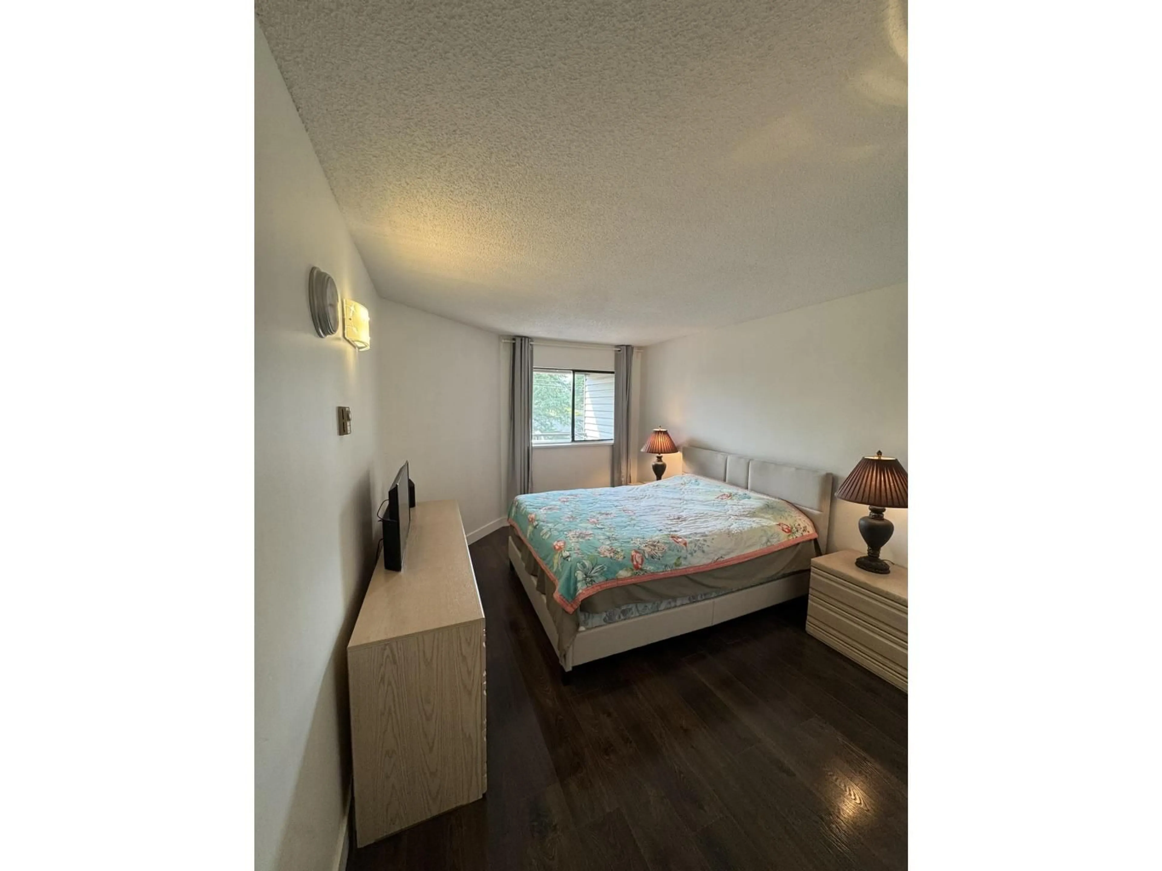 Bedroom with bed, wood/laminate floor for 314 - 5294 204 STREET, Langley British Columbia V3A1Z1