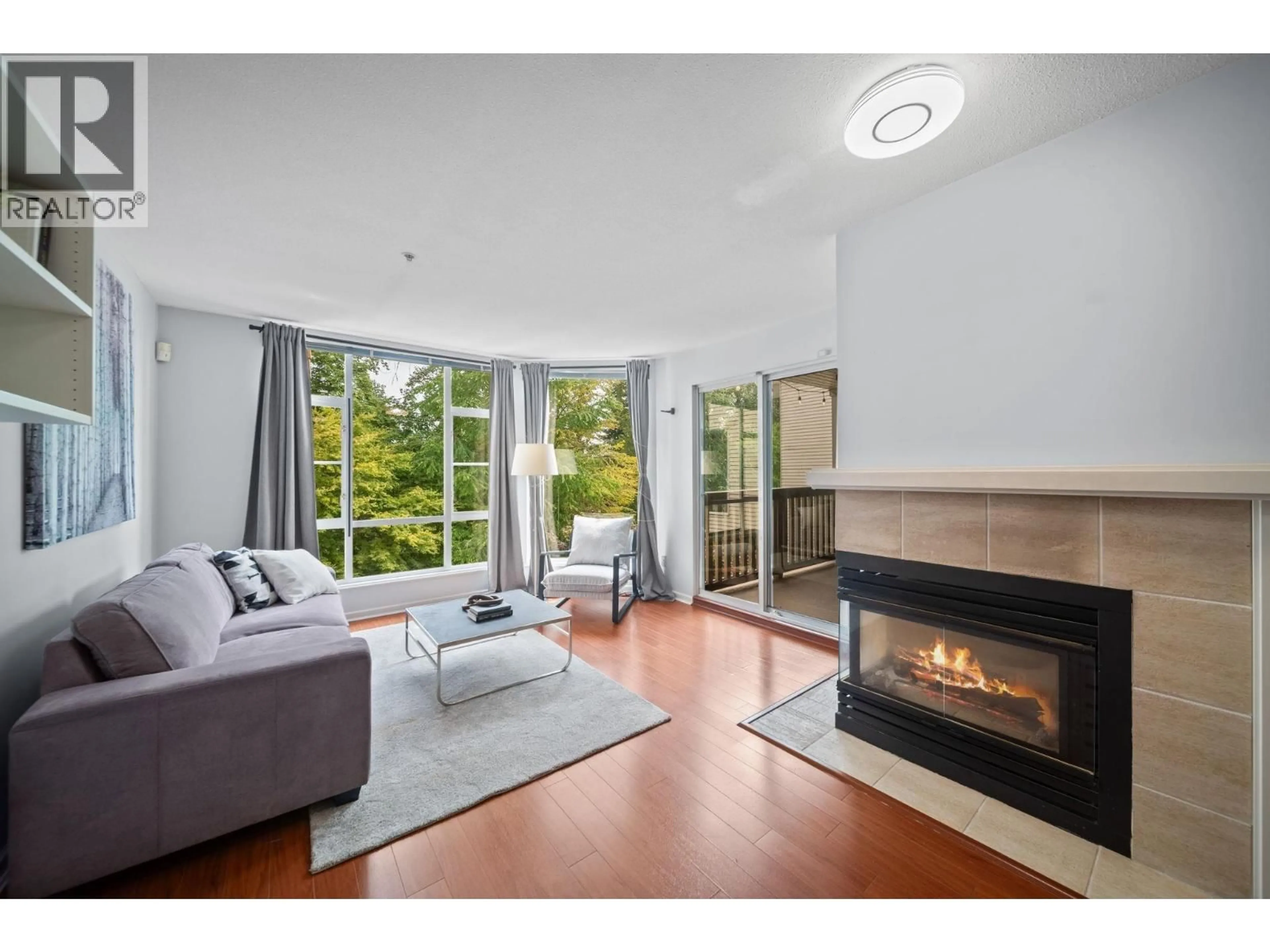 Living room with furniture, unknown for 401 - 22233 RIVER ROAD, Maple Ridge British Columbia V2X3N7