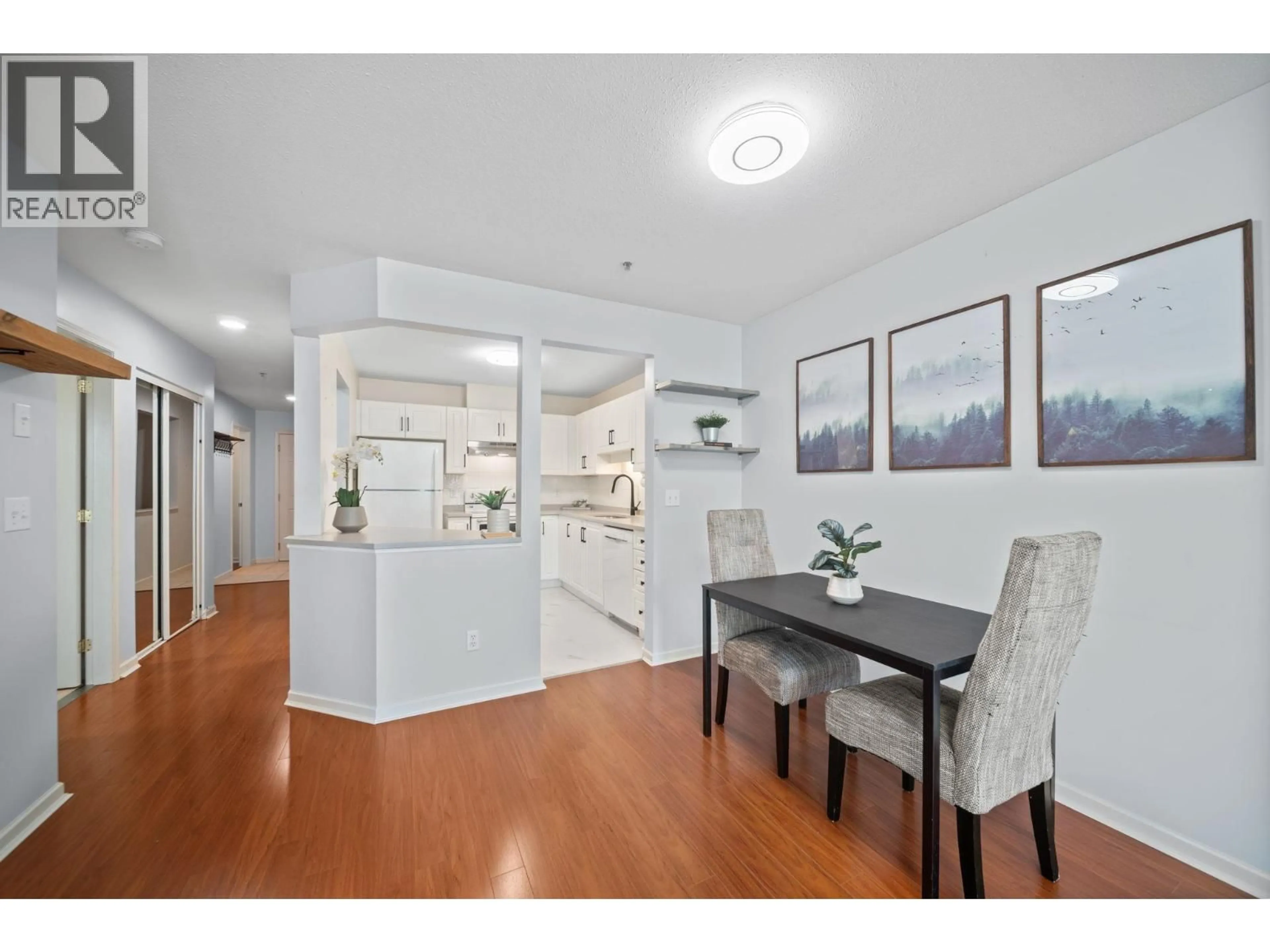 Dining room, wood/laminate floor for 401 - 22233 RIVER ROAD, Maple Ridge British Columbia V2X3N7