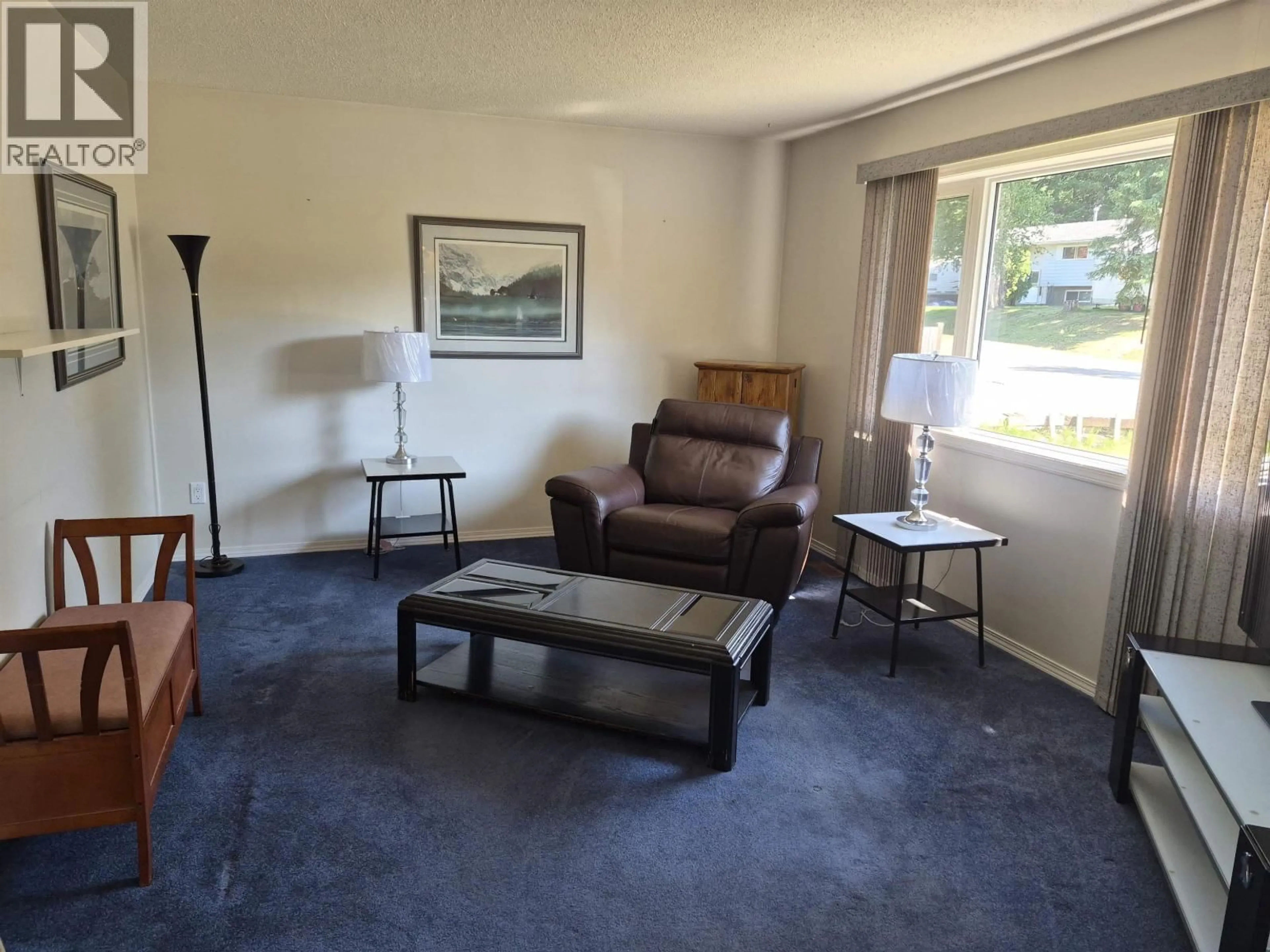 Living room with furniture, carpet floor for 6033 KIM PLACE, Prince George British Columbia V2K3L6