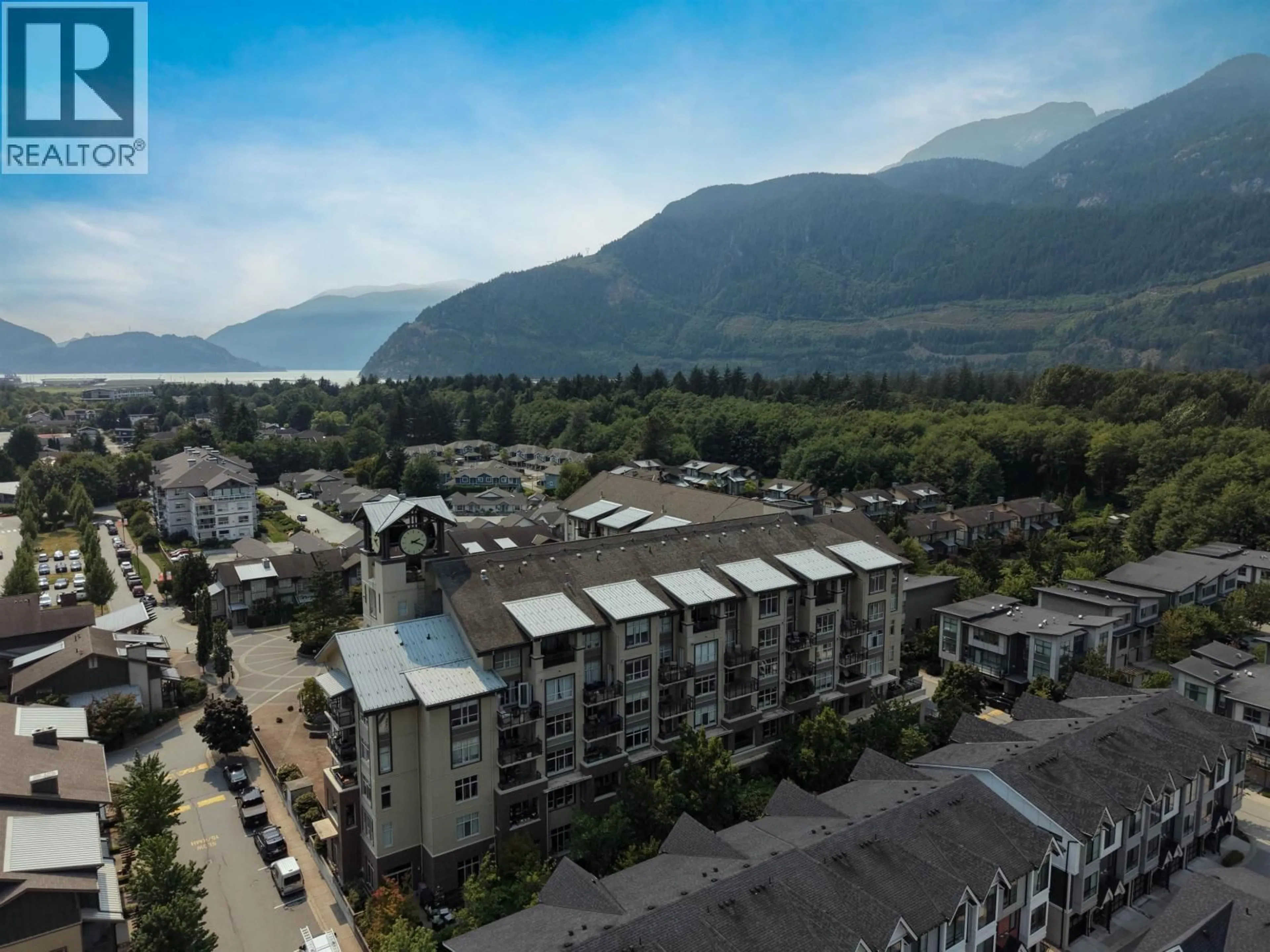 A pic from outside/outdoor area/front of a property/back of a property/a pic from drone, mountain view for 305 - 1211 VILLAGE GREEN WAY, Squamish British Columbia V8B0R7