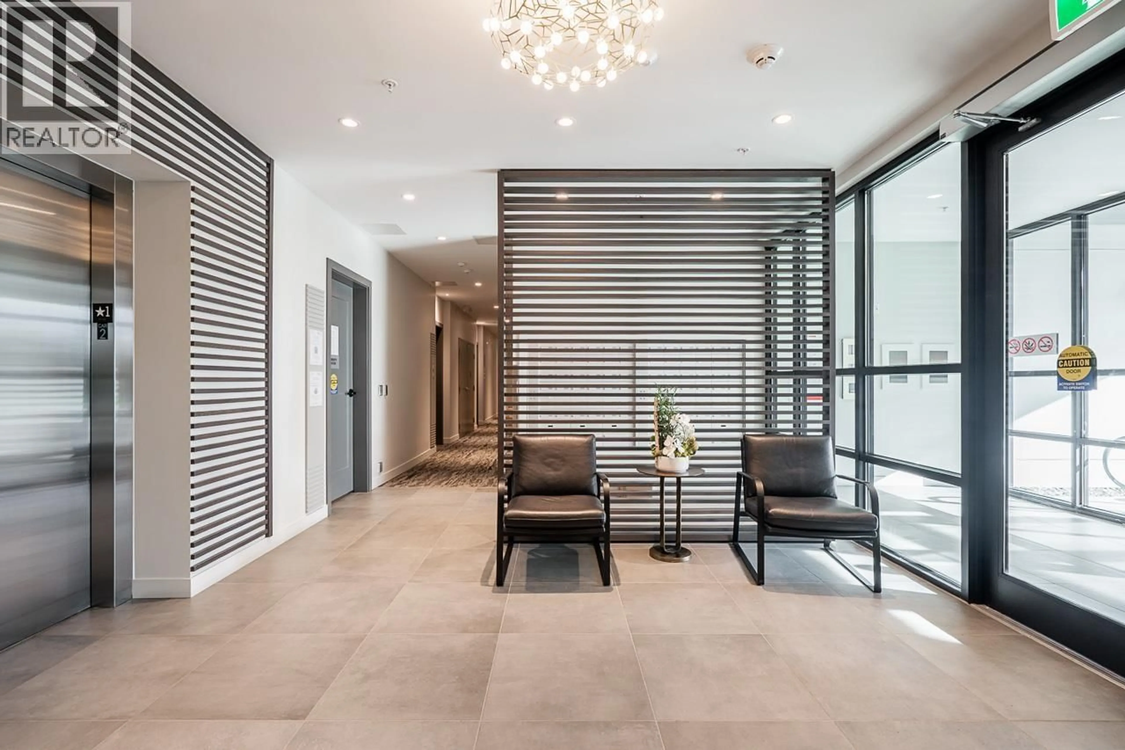 Indoor foyer for 105 - 6859 CAMBIE STREET, Vancouver British Columbia V6P3H1
