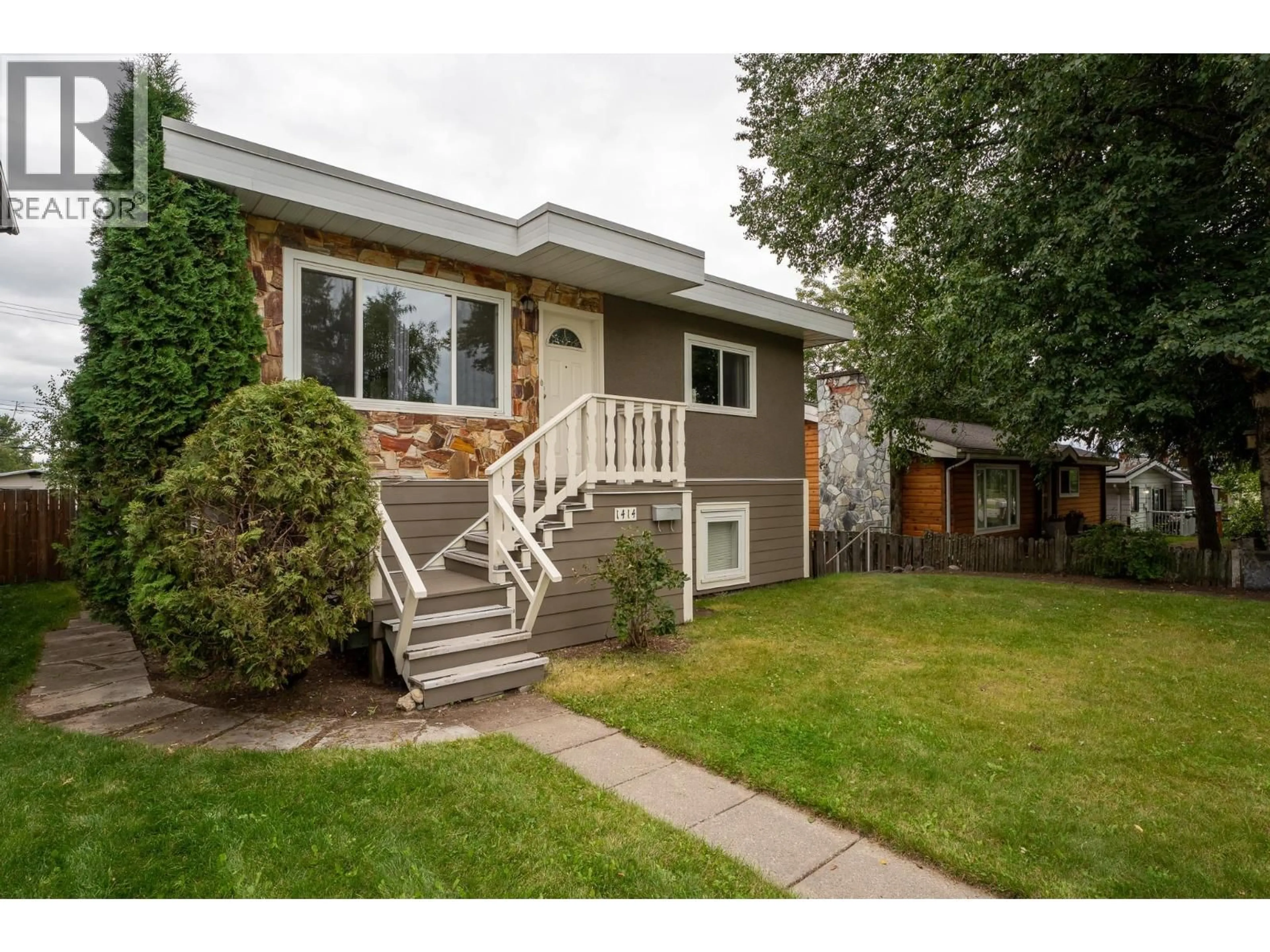 Home with vinyl exterior material, street for 1414 FREEMAN STREET, Prince George British Columbia V2M2R8