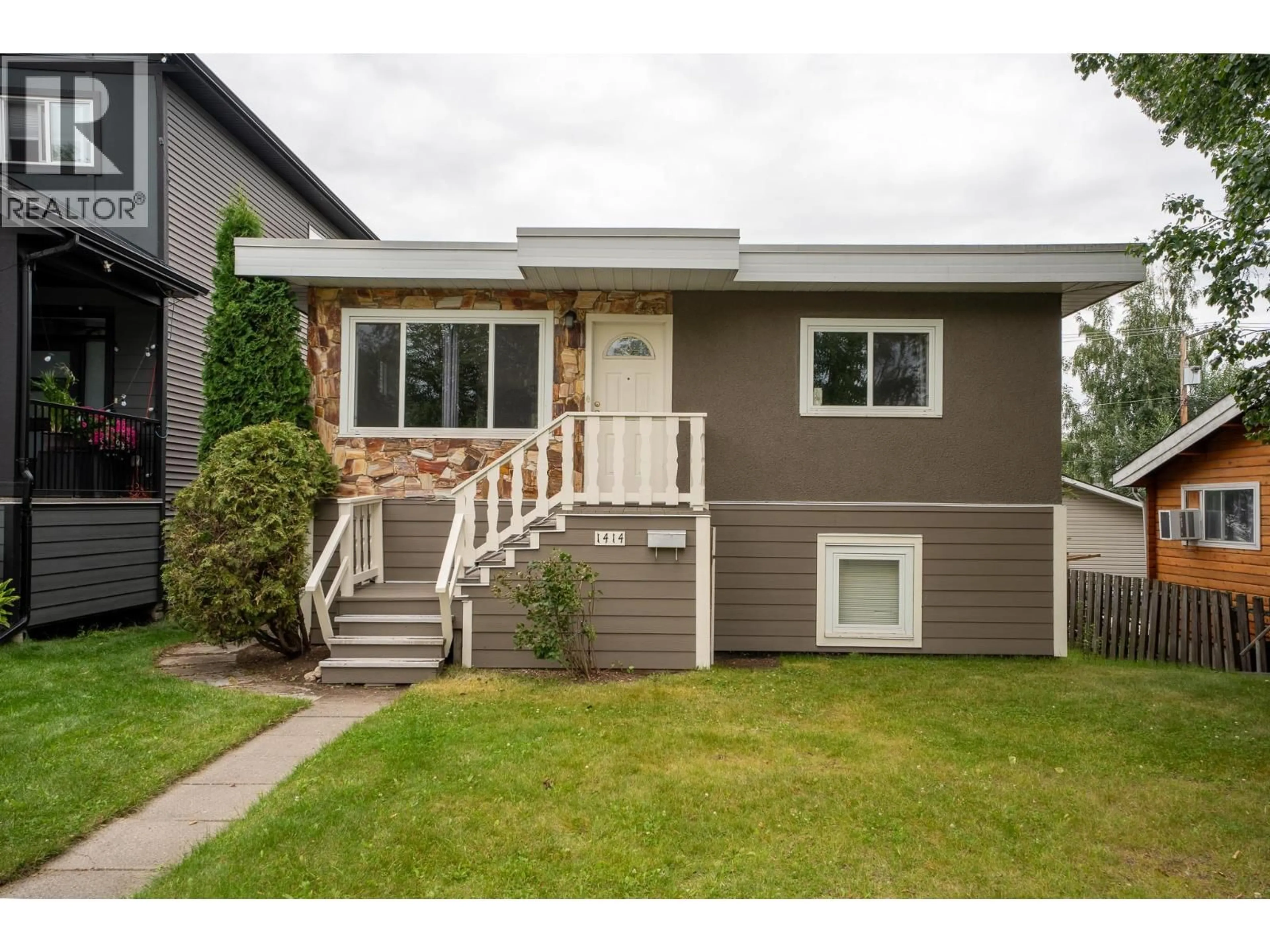 Home with vinyl exterior material, street for 1414 FREEMAN STREET, Prince George British Columbia V2M2R8