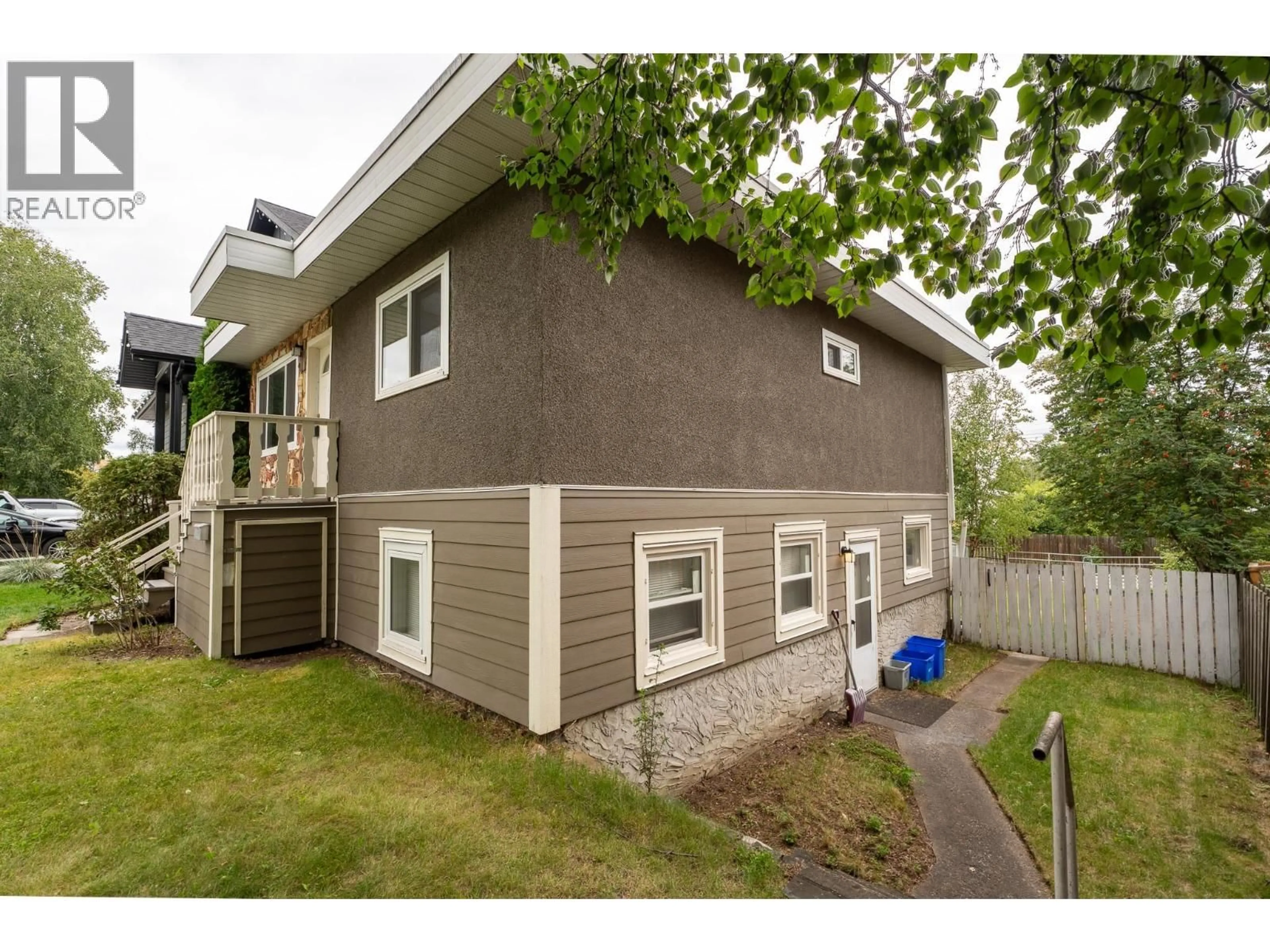 Home with vinyl exterior material, street for 1414 FREEMAN STREET, Prince George British Columbia V2M2R8