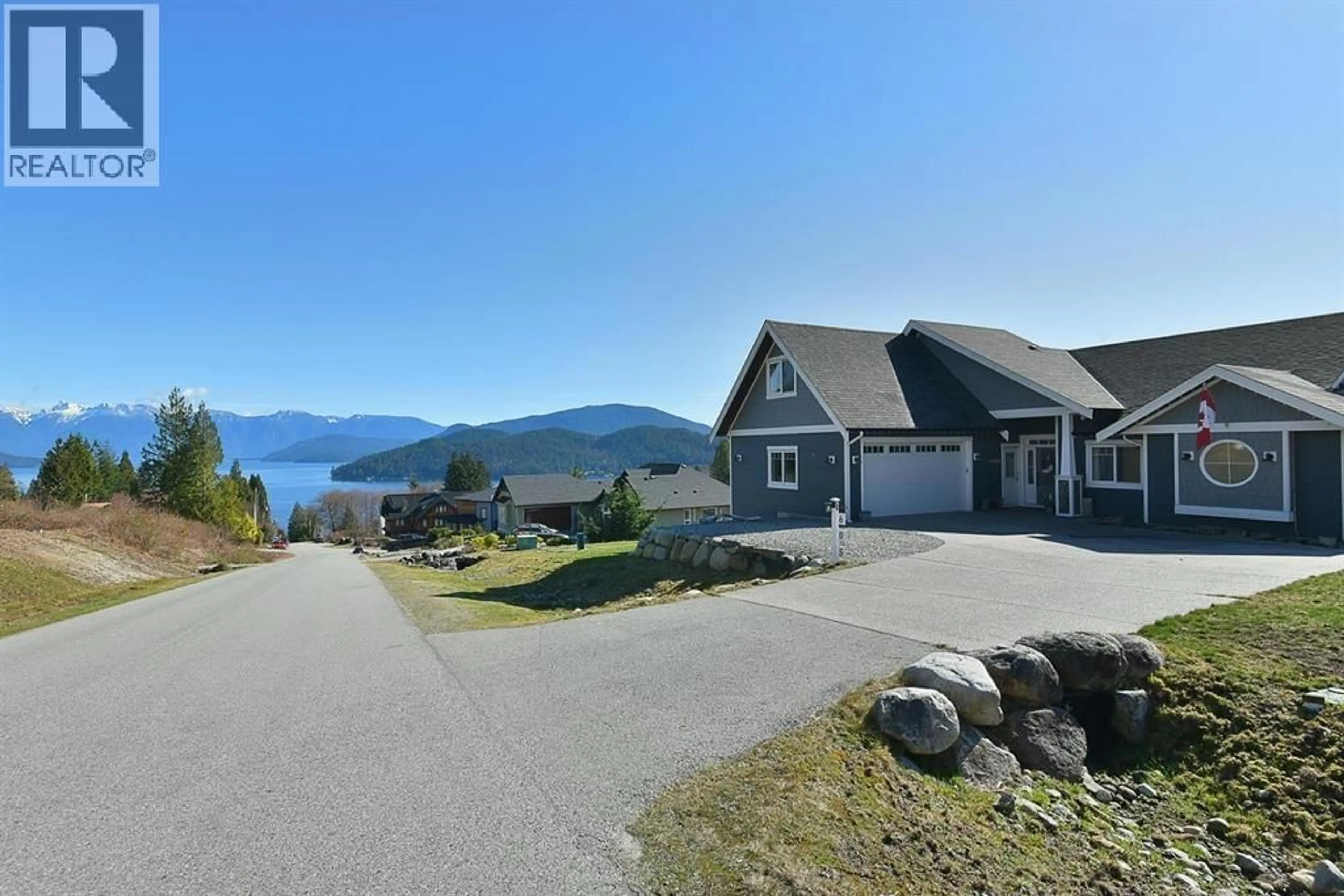 A pic from outside/outdoor area/front of a property/back of a property/a pic from drone, water/lake/river/ocean view for 605 WOODLAND AVENUE, Gibsons British Columbia V0N1V1
