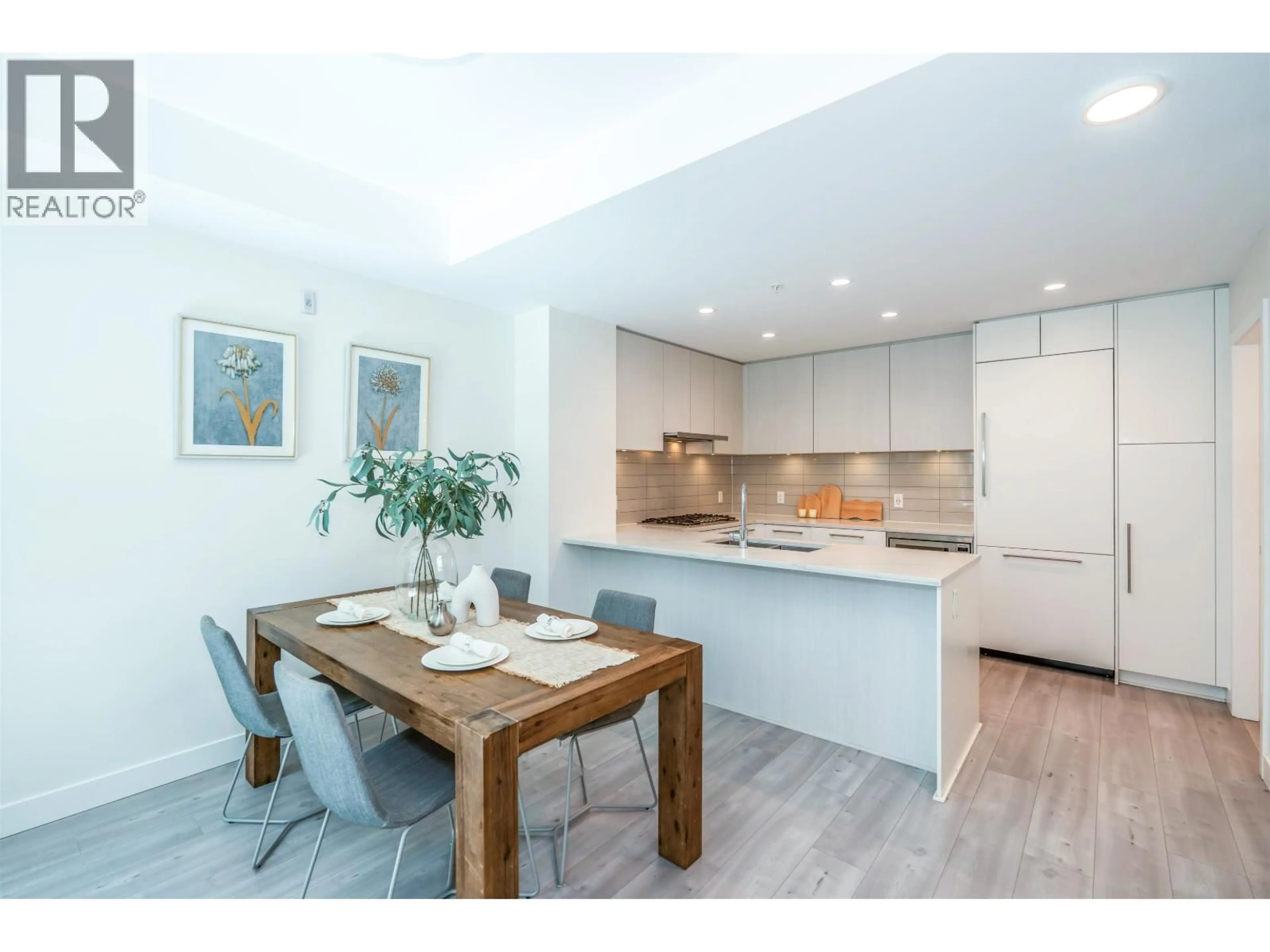 Open concept kitchen, wood/laminate floor for 259 - 2035 GLENAIRE DRIVE, North Vancouver British Columbia V7P1Y3