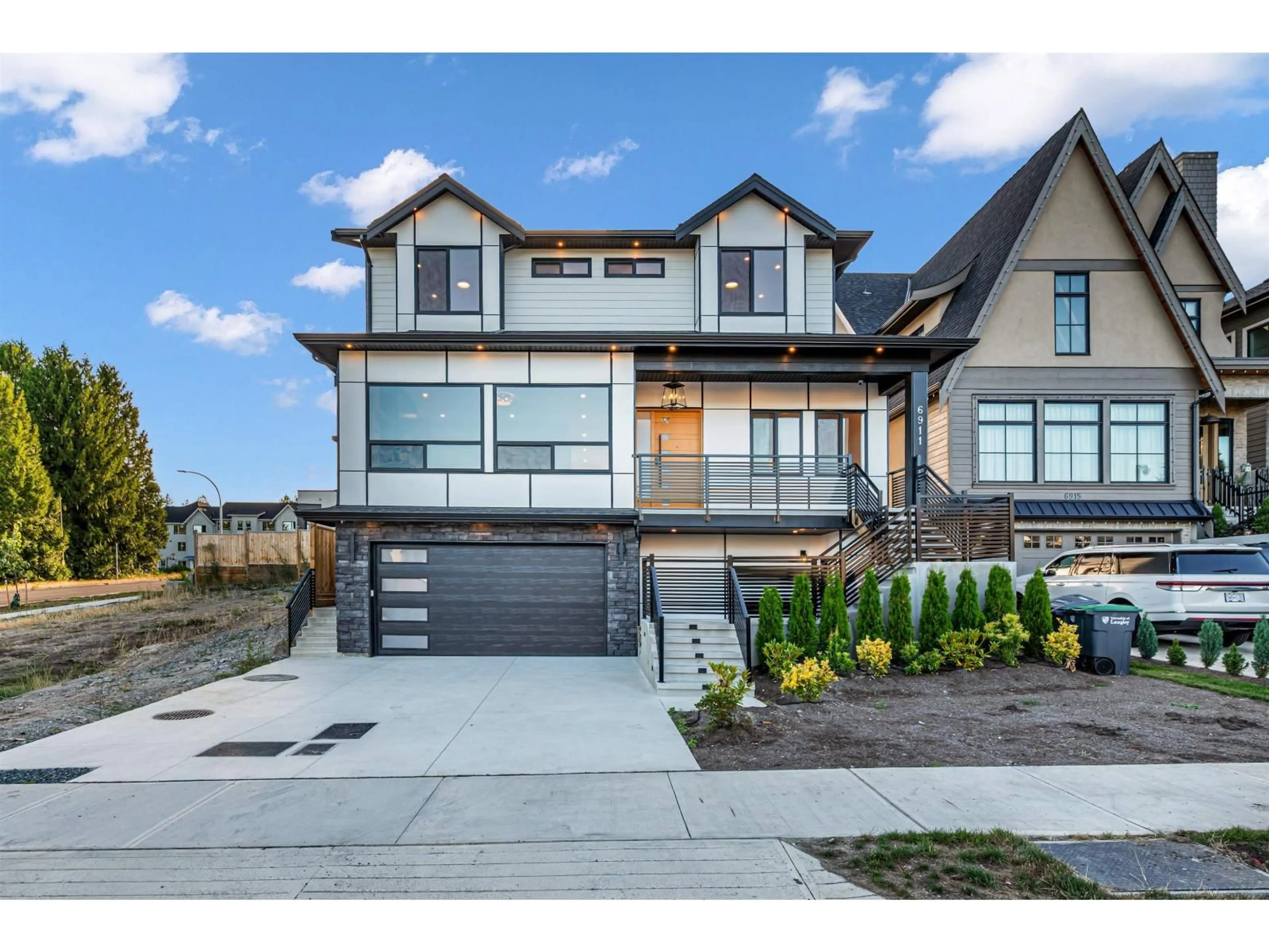 Home with brick exterior material, street for 6911 205 STREET, Langley British Columbia V2Y1R2